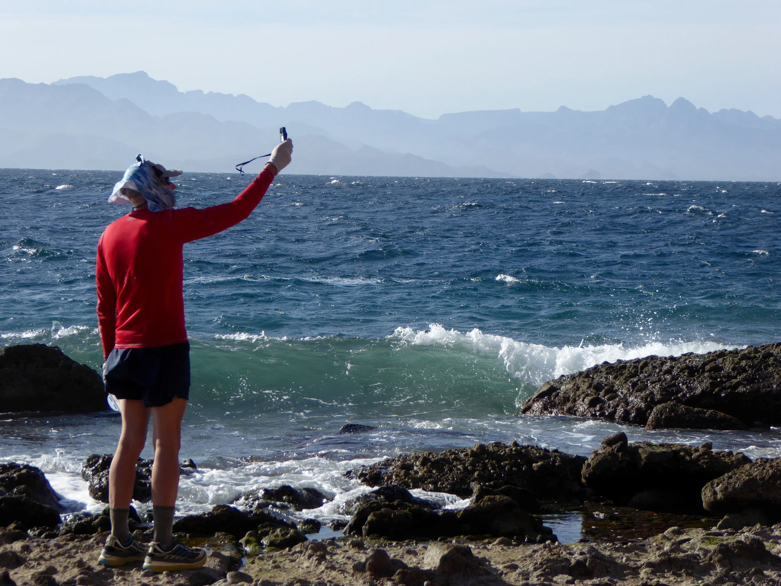 Don checking wind speed. Staying on the beach!