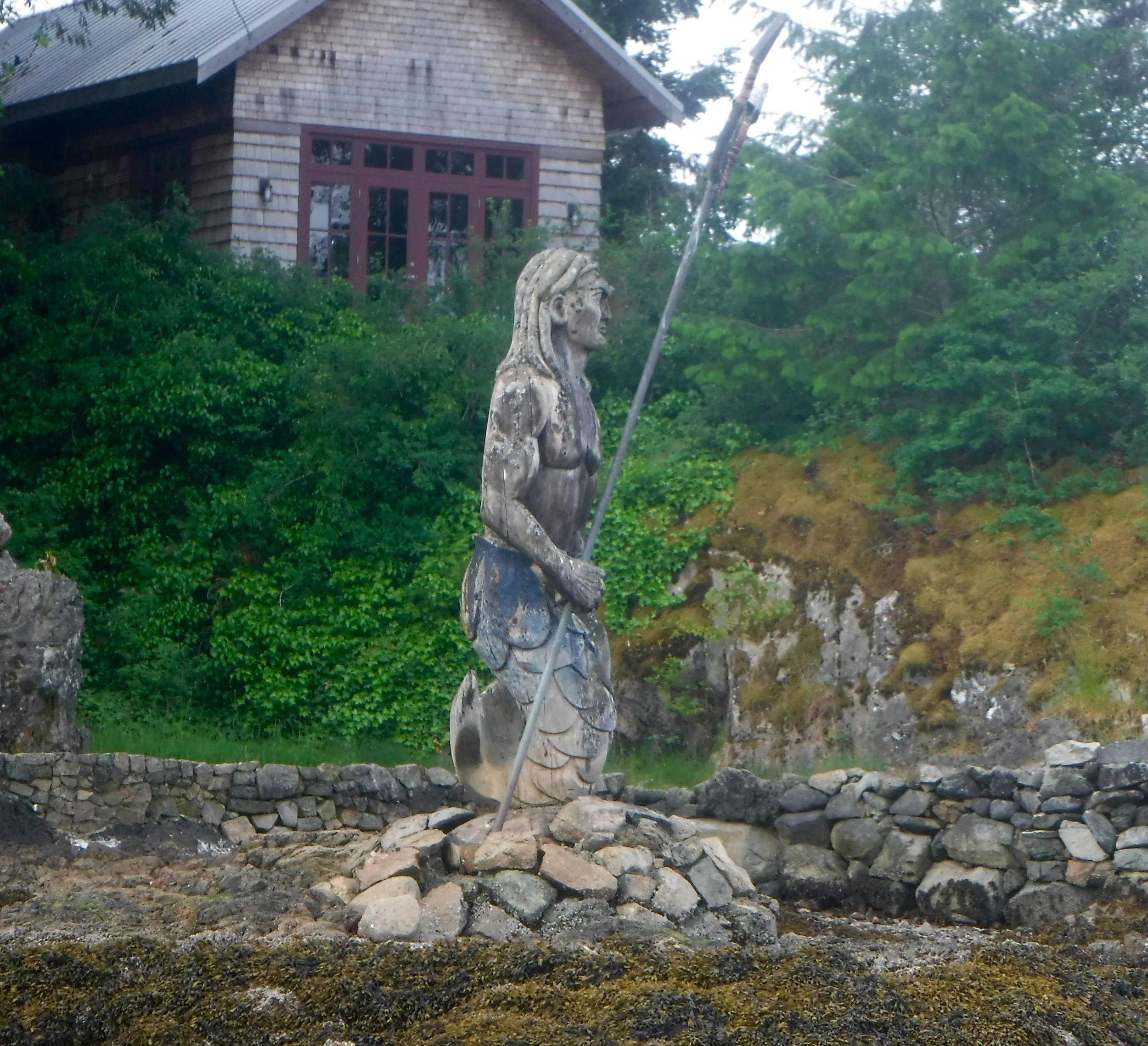 a mermaid statue