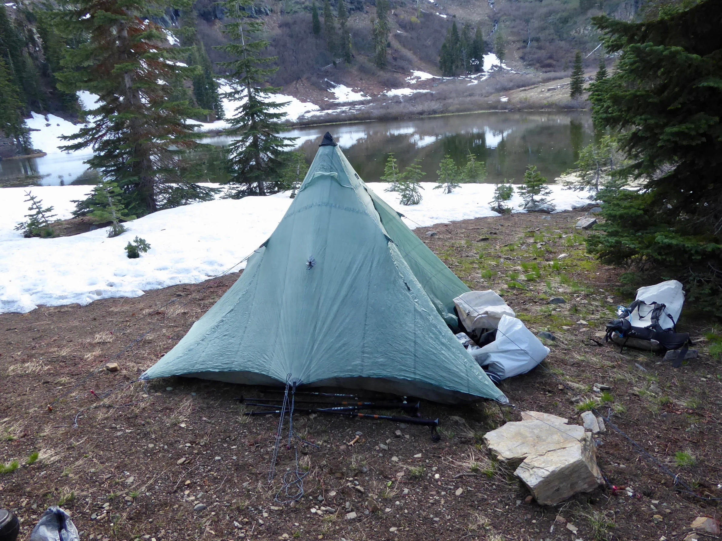 Find a place to set up the tent on snow free ground and are ready for a good night sleep.