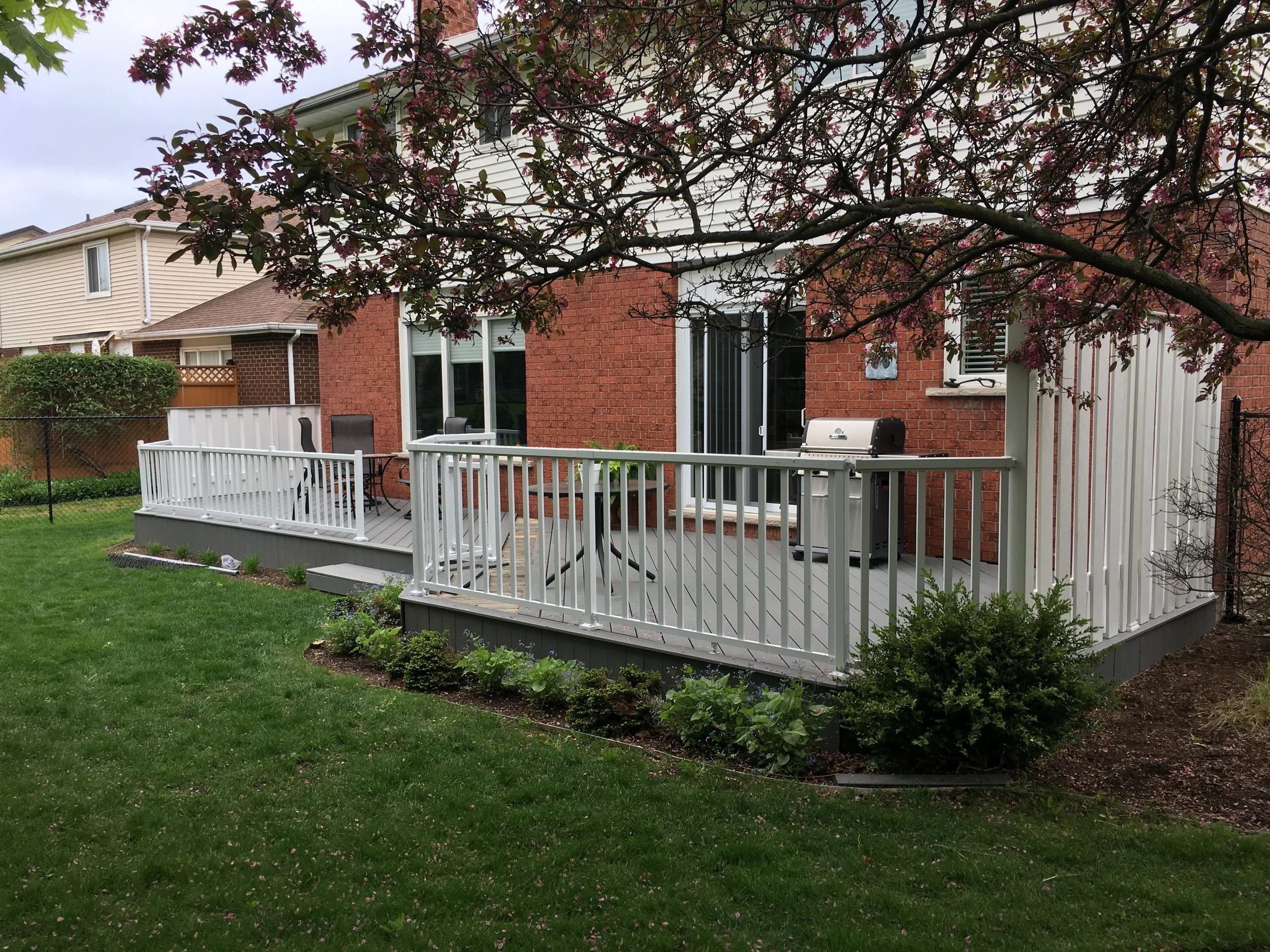 Composite deck, diagonal decking, vinyl privacy screens