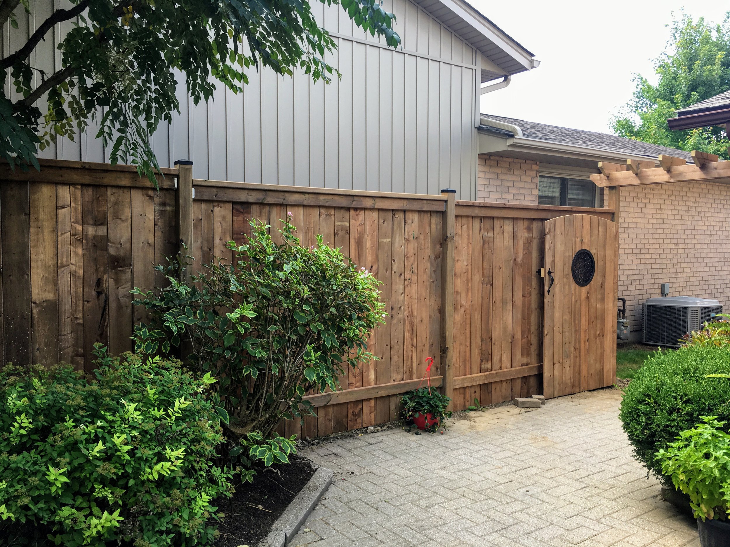 Custom privacy fencing, gate, trellis by Fred's Fences