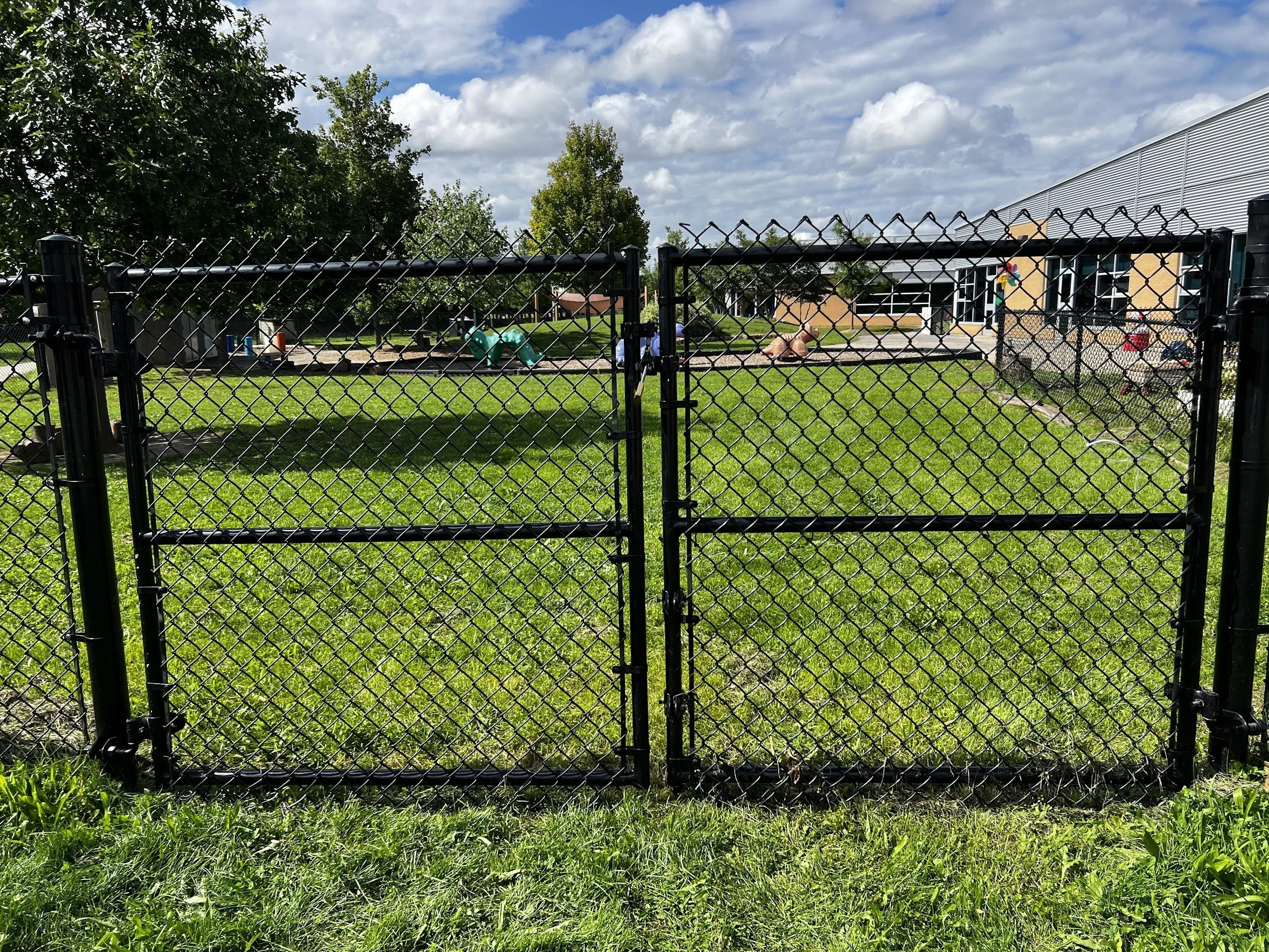 Double gates provide access into yard