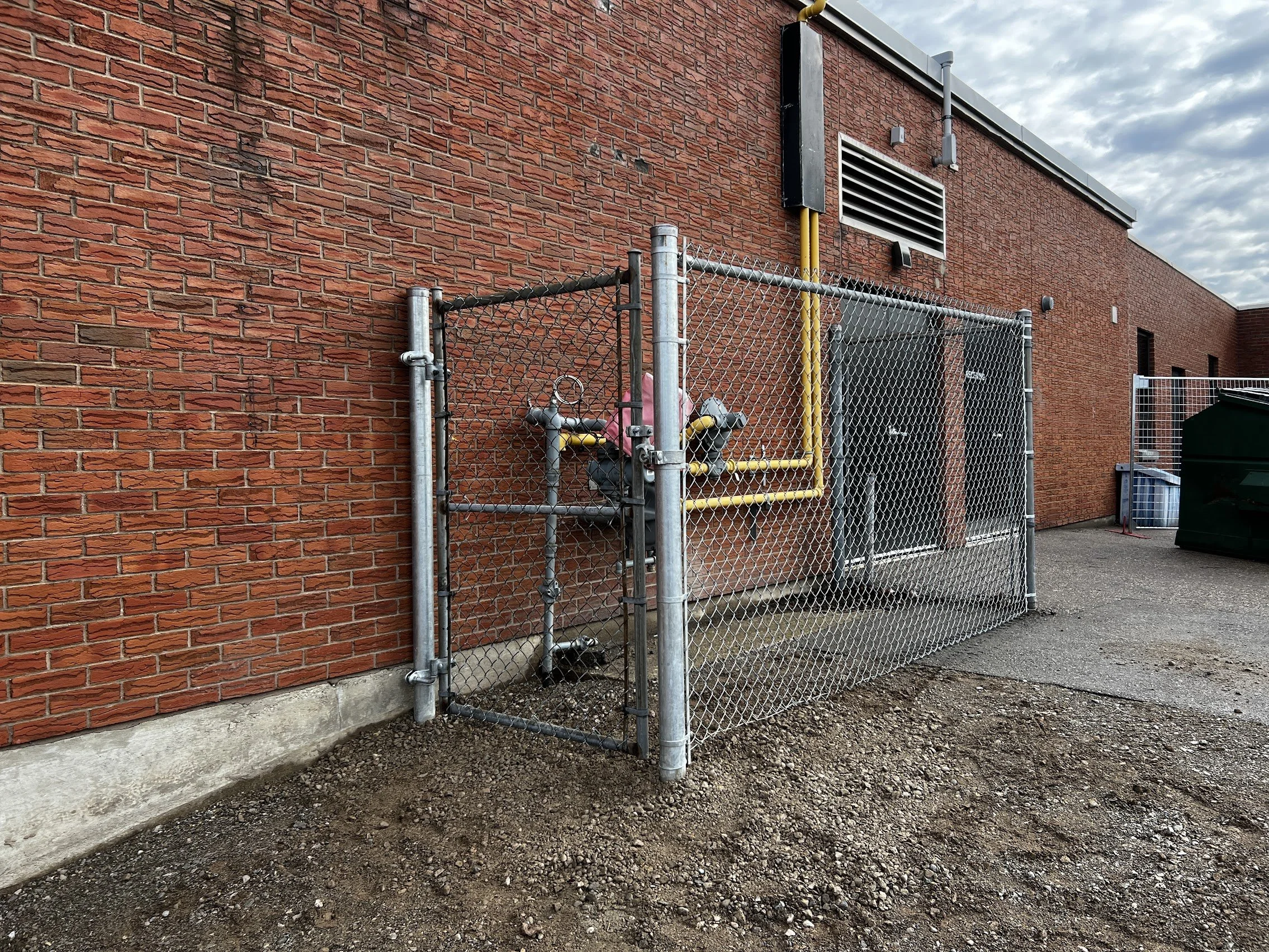 Equipment and utility enclosure fencing by Fred's Fences