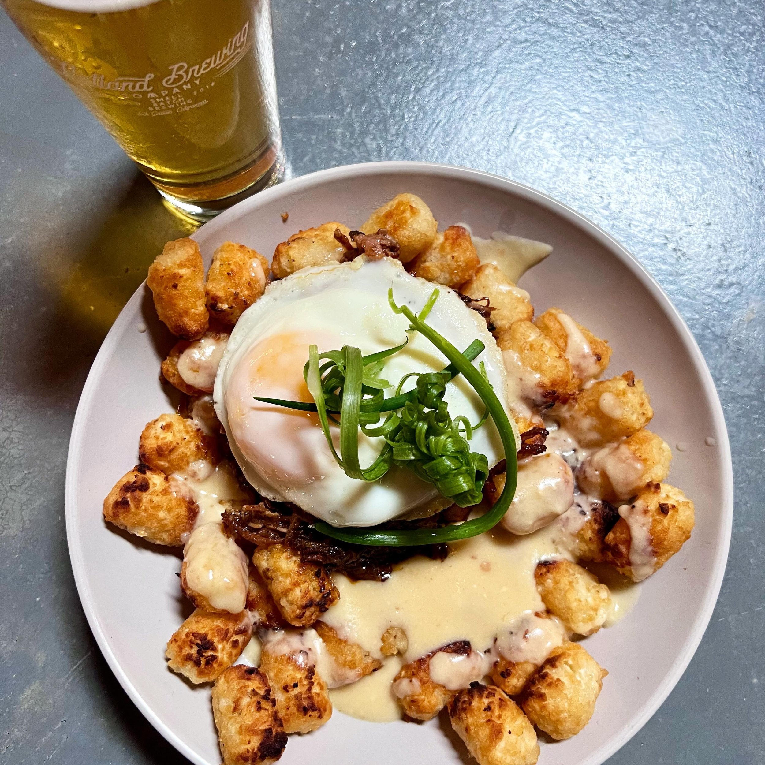 Brunch is on! Every Sat &amp; Sun, 10am-1pm&hellip;and the Brunch Tots are 💣! 

Come scope out EG&rsquo;s &ldquo;Almost Famous&rdquo;  Brunch sometime&hellip;.We&rsquo;ll leave a beer on for ya. 🍻🥚🍳🥣🧇

#flatlandbrewing&nbsp;#thepizzapeelpizza&n