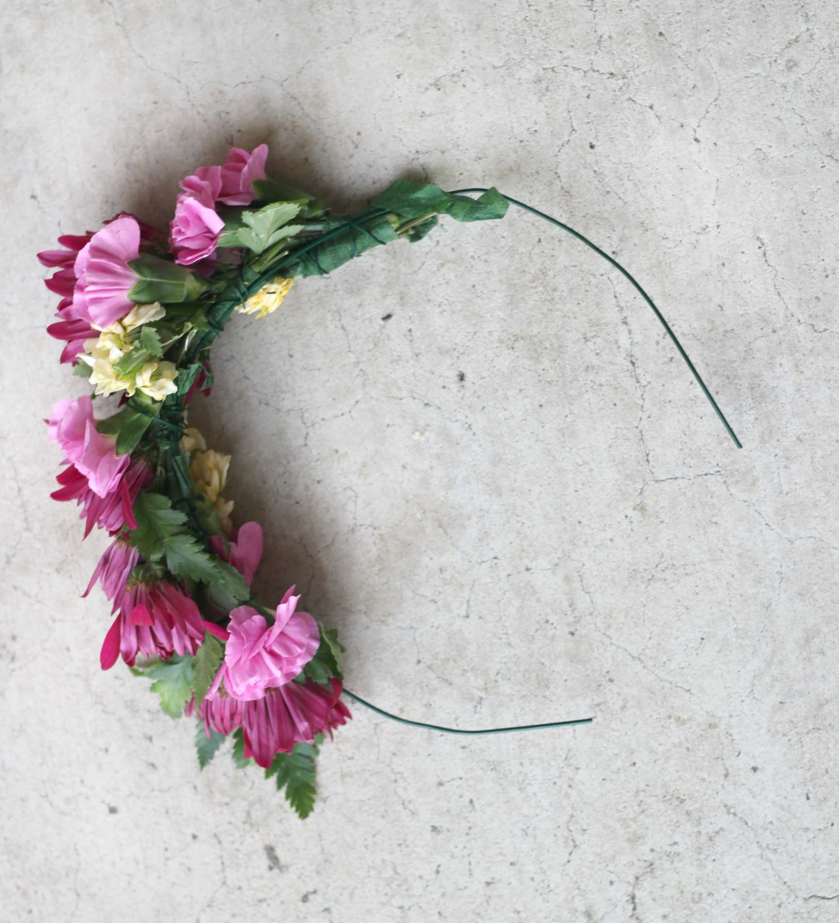 I made my own flower crown from this tutorial I saw on Pinterest. I got all my supplies from Michael's and fresh carnations from my local grocery store. It seemed pretty easy but next time I won't get the thick wire because it wasn't as easy to hide the pointy ends. However, I'll be making myself this crown a lot more in the future, loved it.
