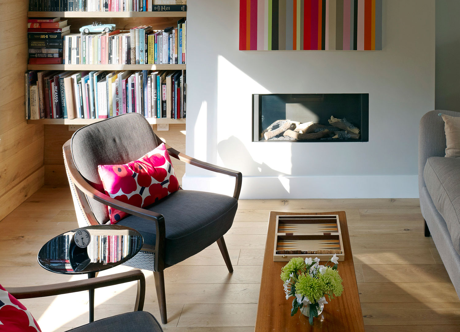 Jill Scholes Interior design, mews house sitting room with fire place and book shelves