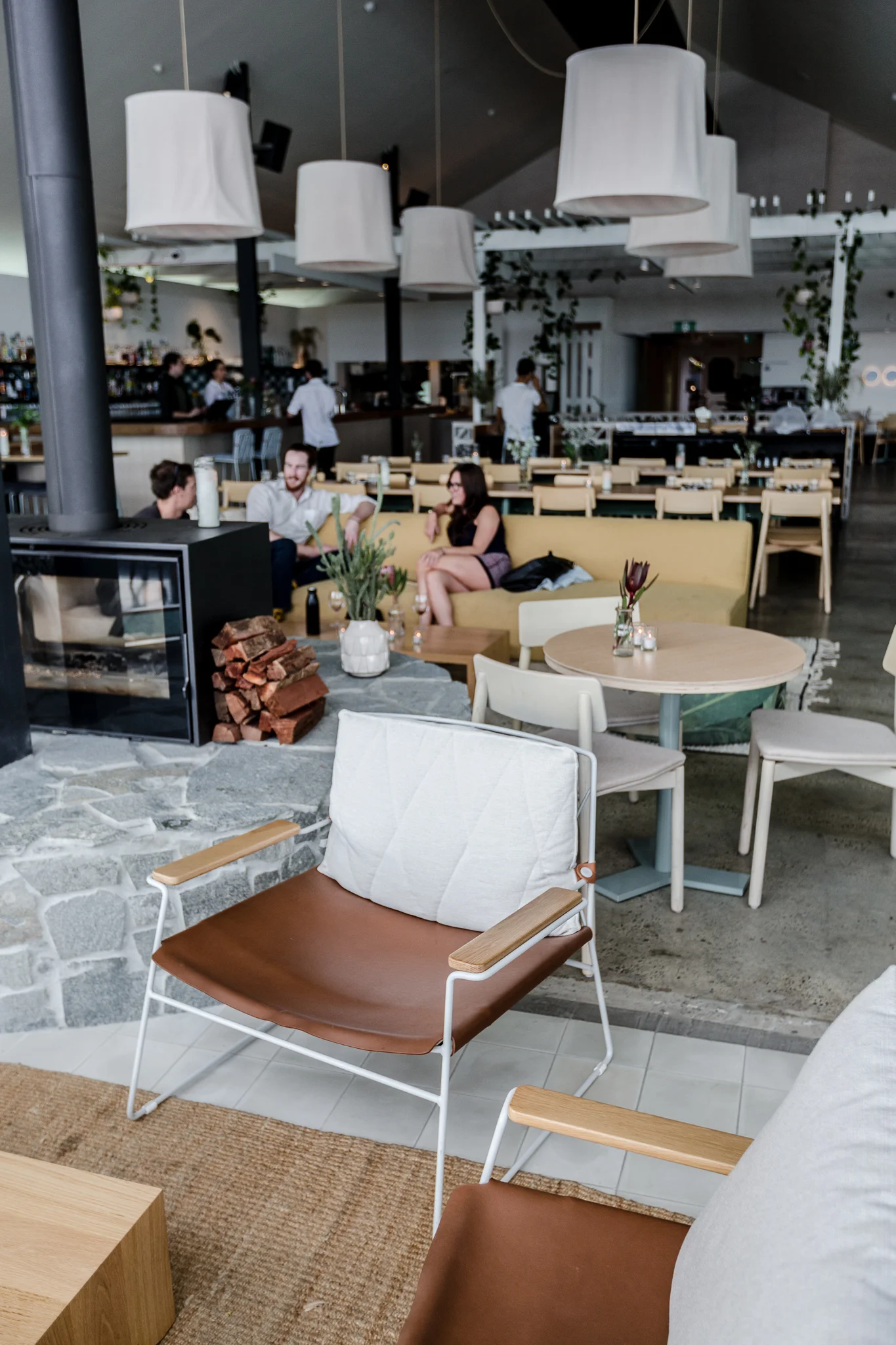 Jasmine Ann Gardiner - Perth Interiors Photographer Helm Fremantle Modern Bar Restaurant White and Tan Chair Fireplace