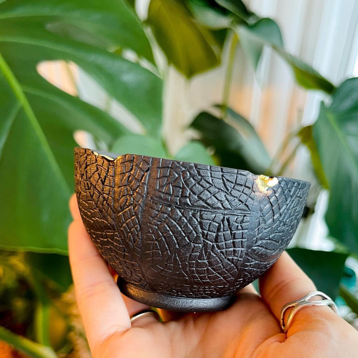 This tiny charcoal &ldquo;perfect imperfections&rdquo; bowl with gold chips on the rim is one of my favorites from the latest kiln. It&rsquo;s currently being boxed up for its trip to Colorado to hang with the super talented @sgmetalsmithing. Safe jo