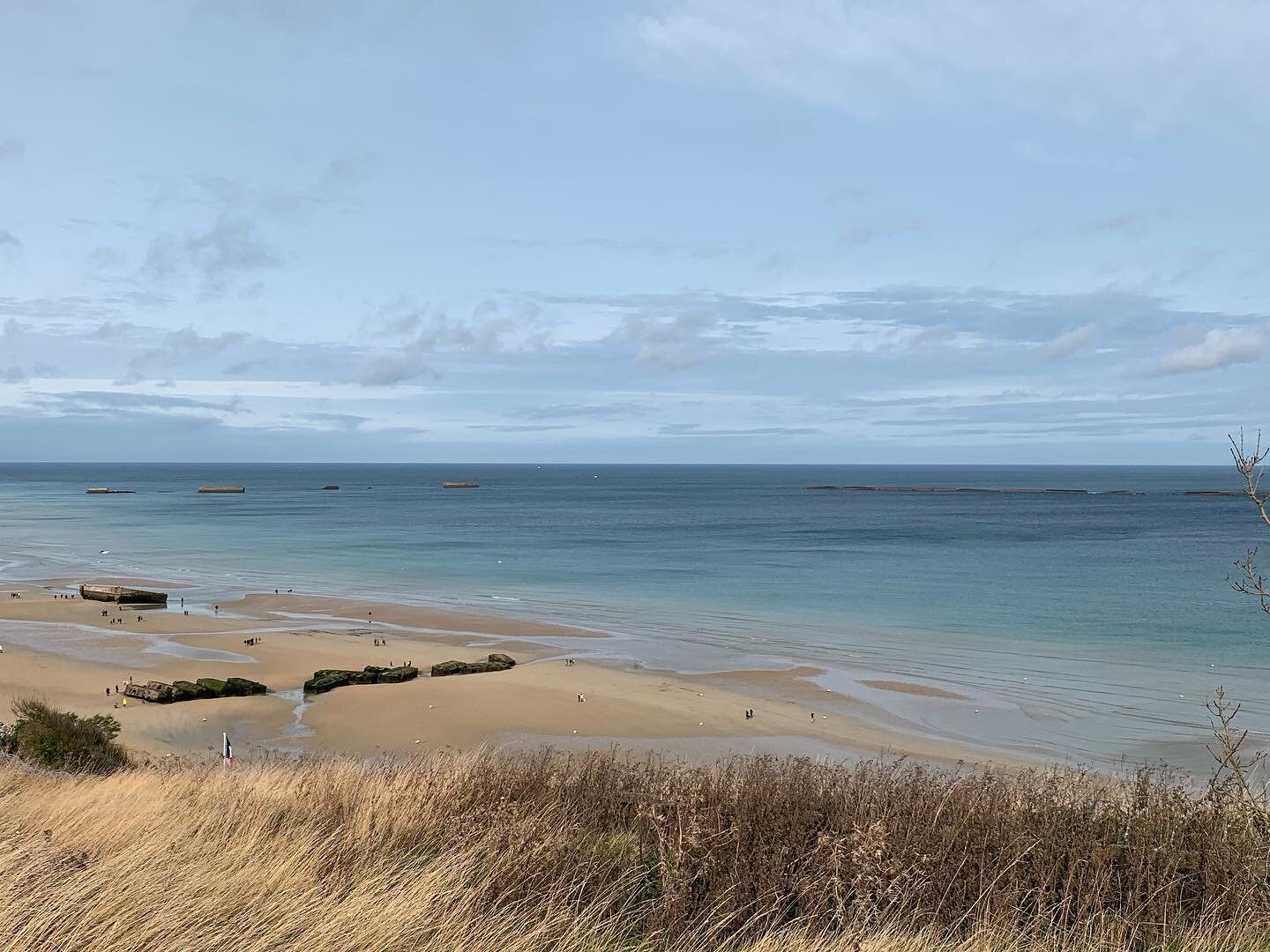Arromanches-les-Bains is one of my favorite Normandy Landings beaches thanks to its artificial port. At low tide, you can explore the remains of the massive metal structures that were built in Britain and floated across to France in preparation for O