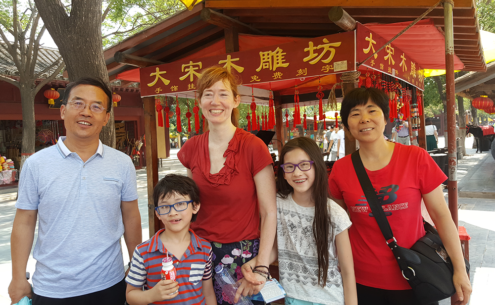Mr. and Mrs. Li with one of our family.