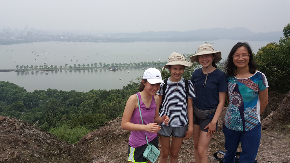 Xiaowen and our students at the top of Bao Shi Shan overlooking China's famous West Lake.