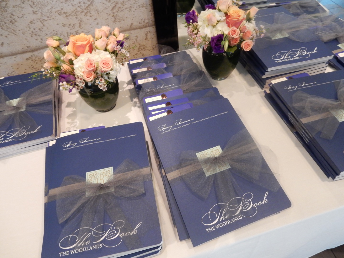 Each attendee walked away with copies of The Book The Woodlands, tied in beautiful ribbon.