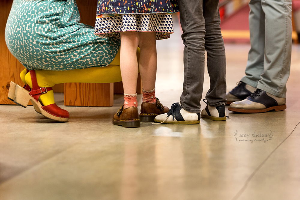 colorful shoes on family of four