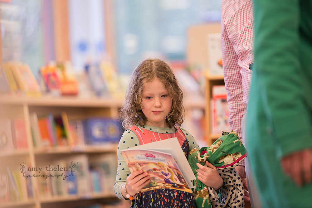 girl holding book