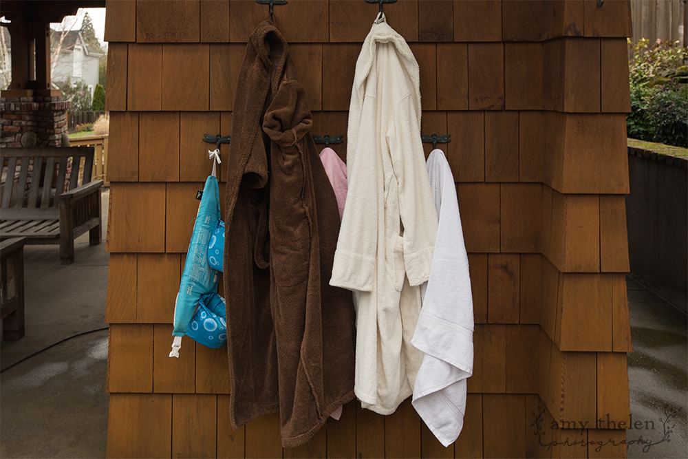 family's robes and towels after pool