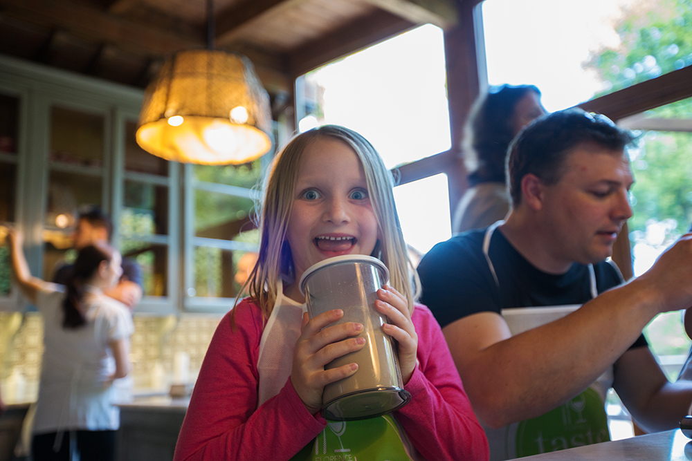 girl excited holding gelato container