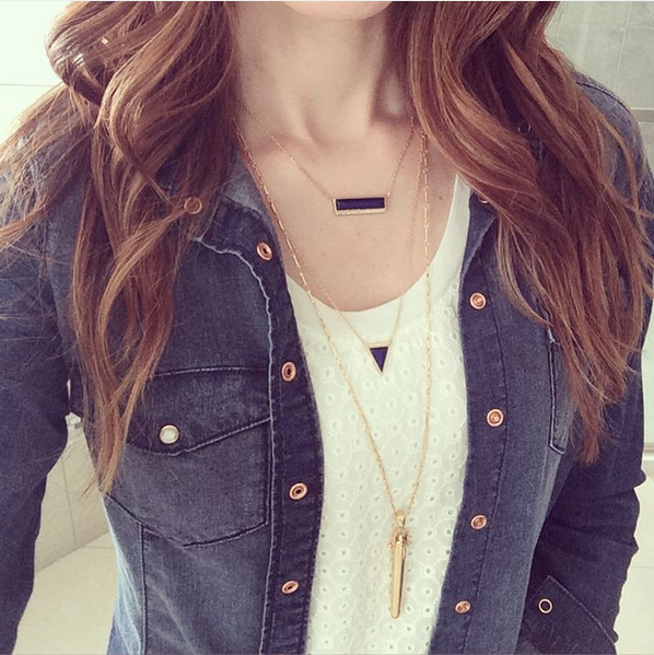 Colored gemstones make this layered look stand out.
