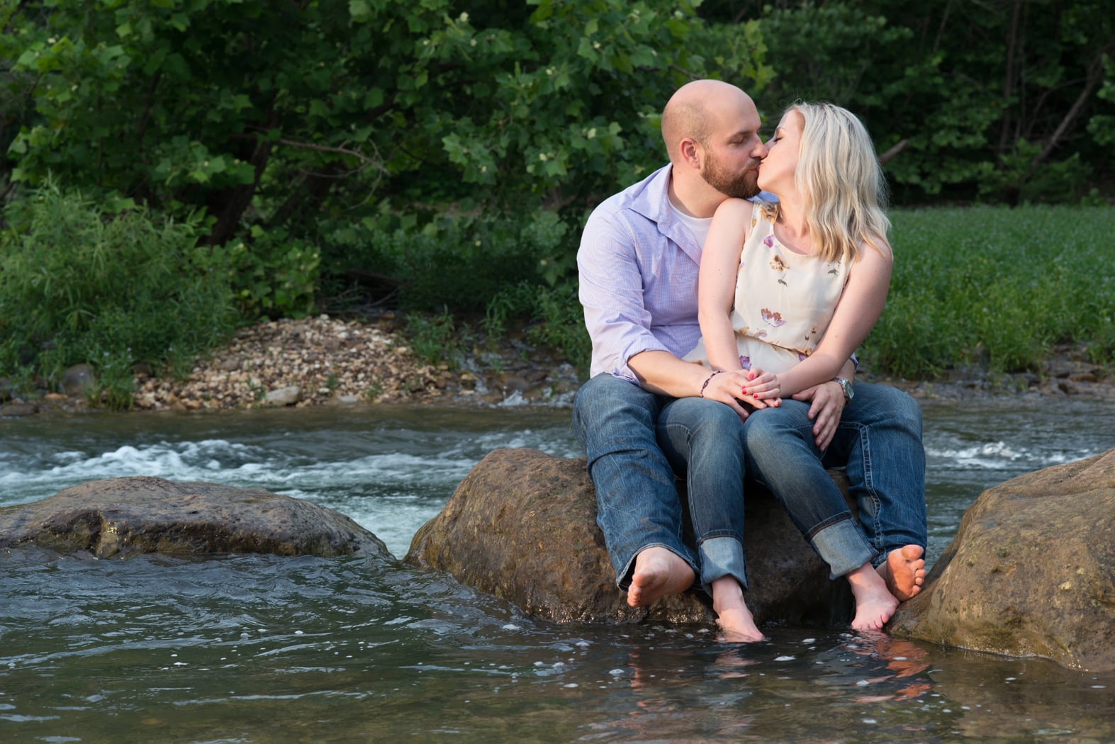 Couple kisses in Buffalo River