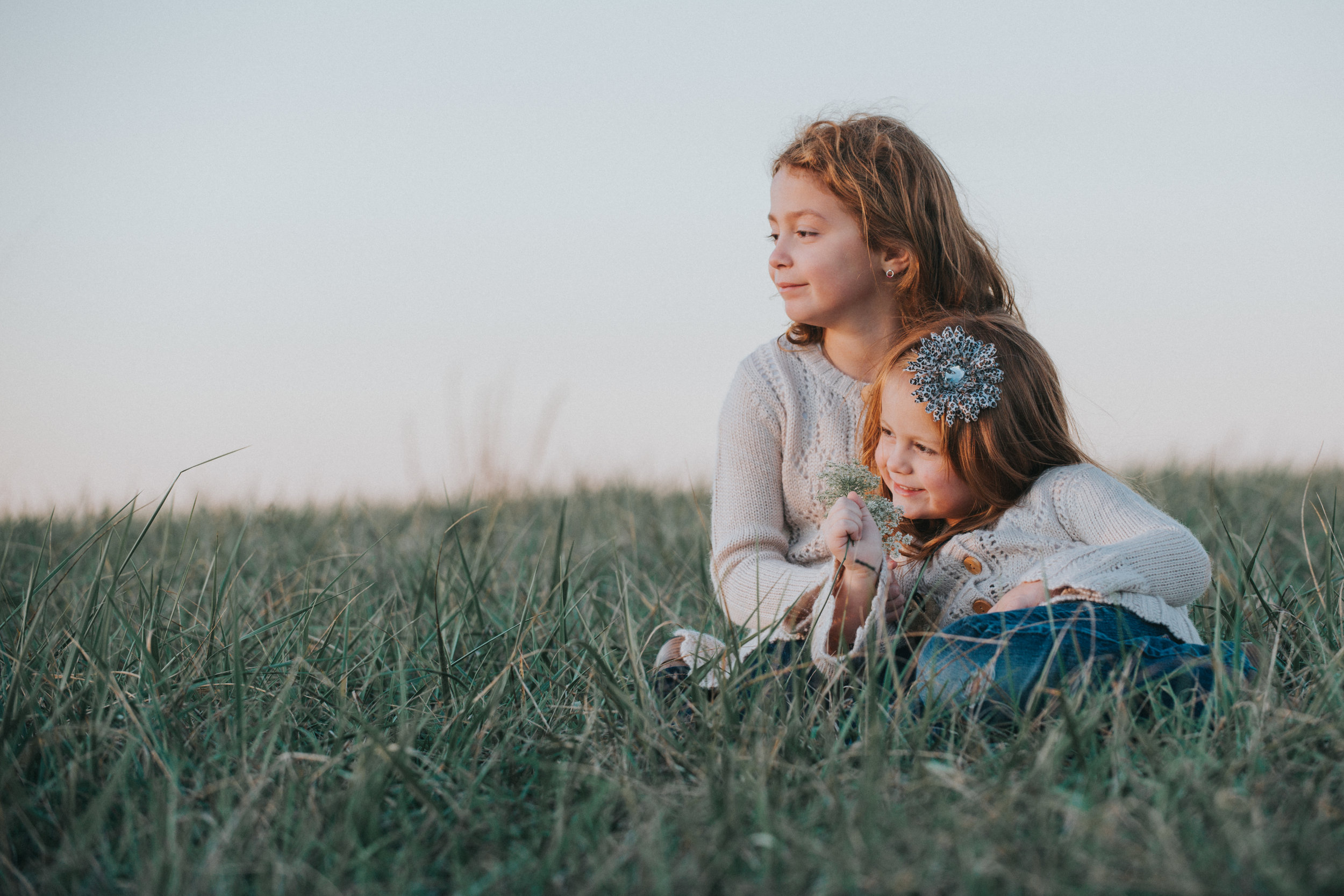 two little girls in a mountain meadow