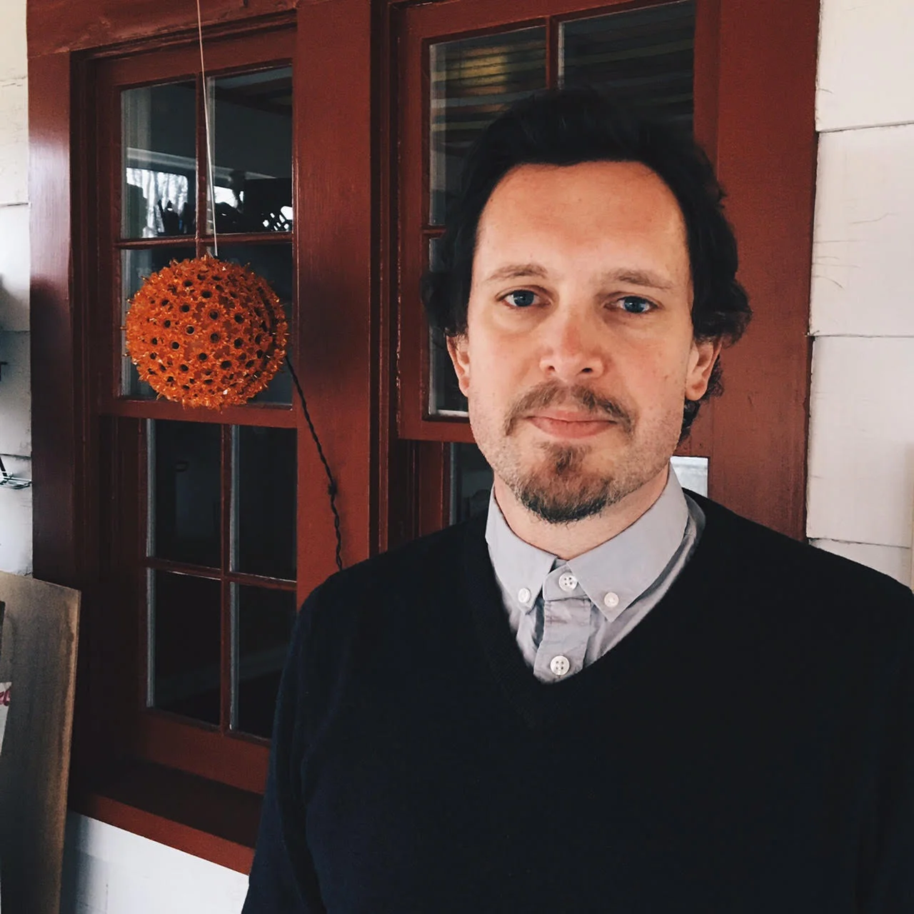 Patrick Conrade on his back porch. (Photo: Cedar Cathedral)