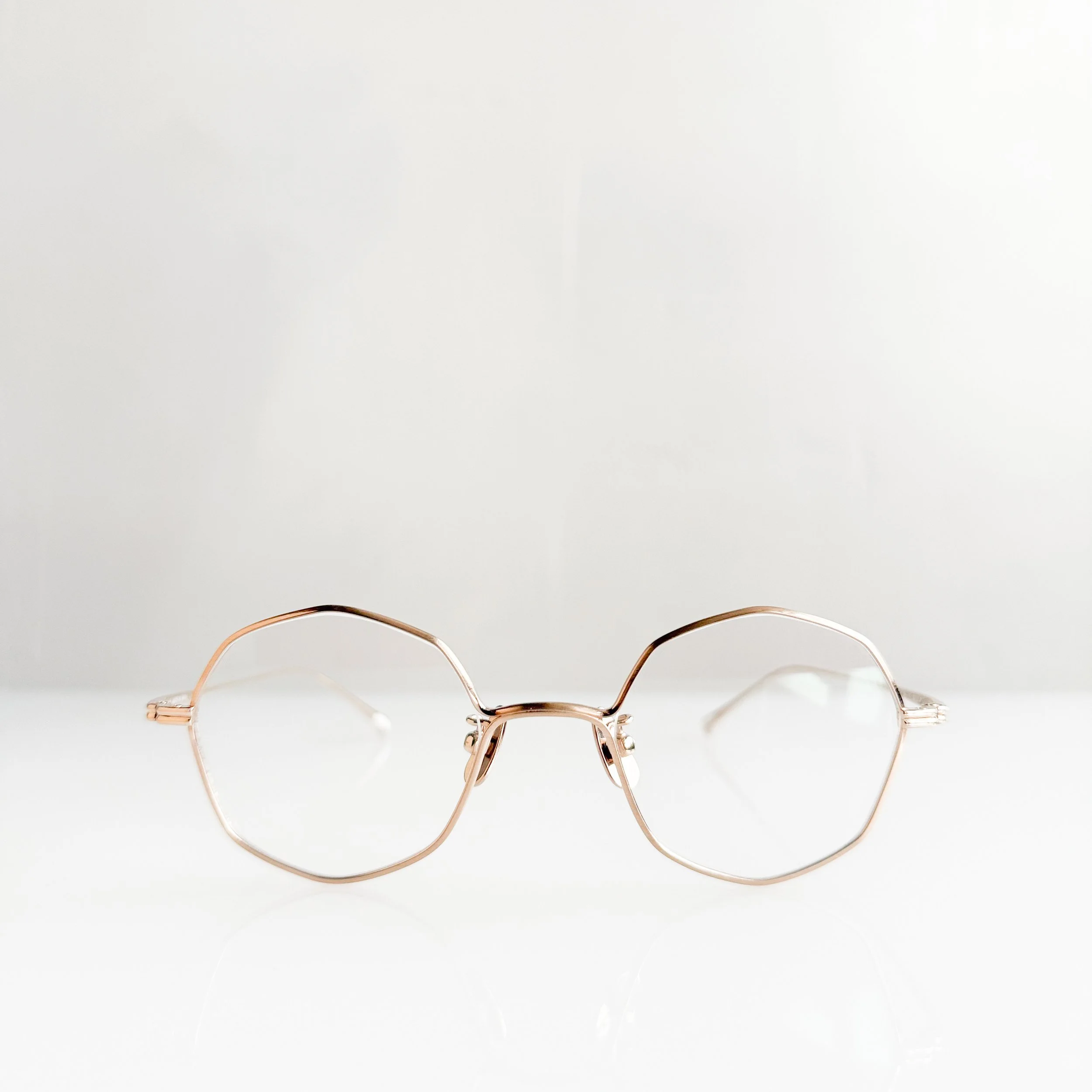 yuichi-toyama-brandt-u-147-col-3-gold-octagonal-glasses-2.jpg