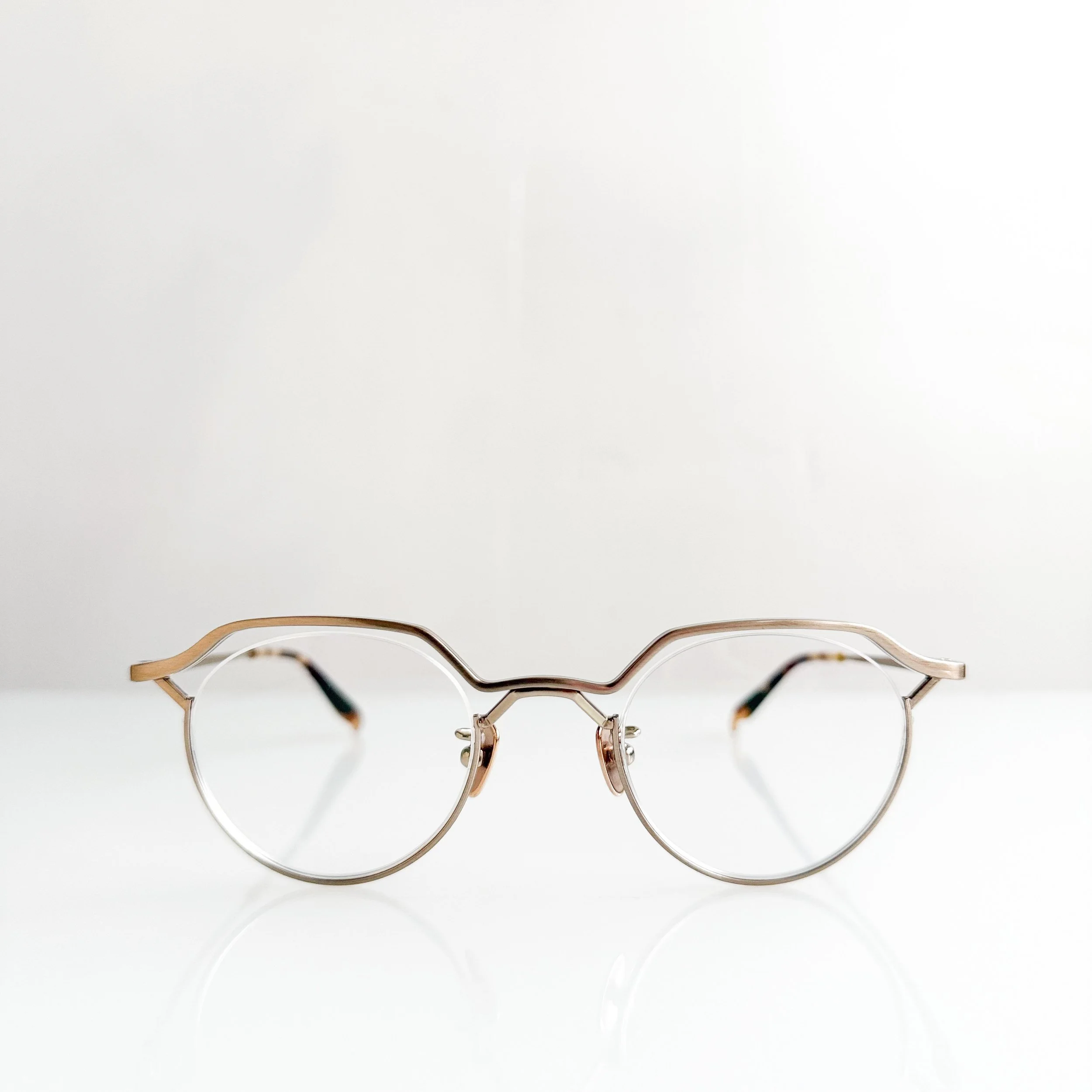 yoshinori-aoyama-ya-011-col-01-shearing-gold-rimless-glasses.jpg