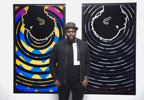 Damien Davis, (spring '16 fellow), in front of two of his artworks at MoMA, NYC, Feb. 2017.