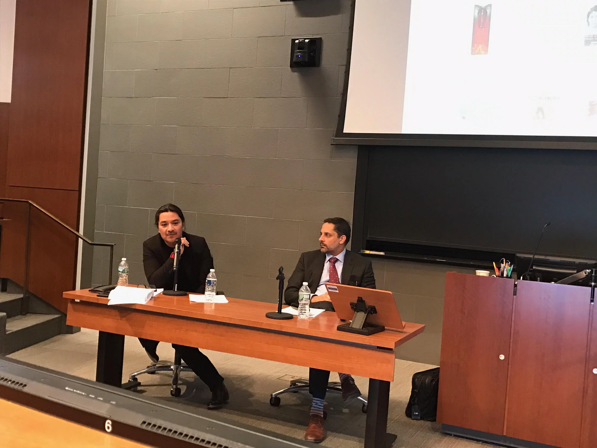Dean of Cornell Law School and Professor of Law, Eduardo Peñalver (right) and Sergio Munoz Sarmiento discussing property law, disobedience and contemporary art at the Felix Gonzalez-Torres Symposium, which was held on March 18, 2017 at Cornell Law School.