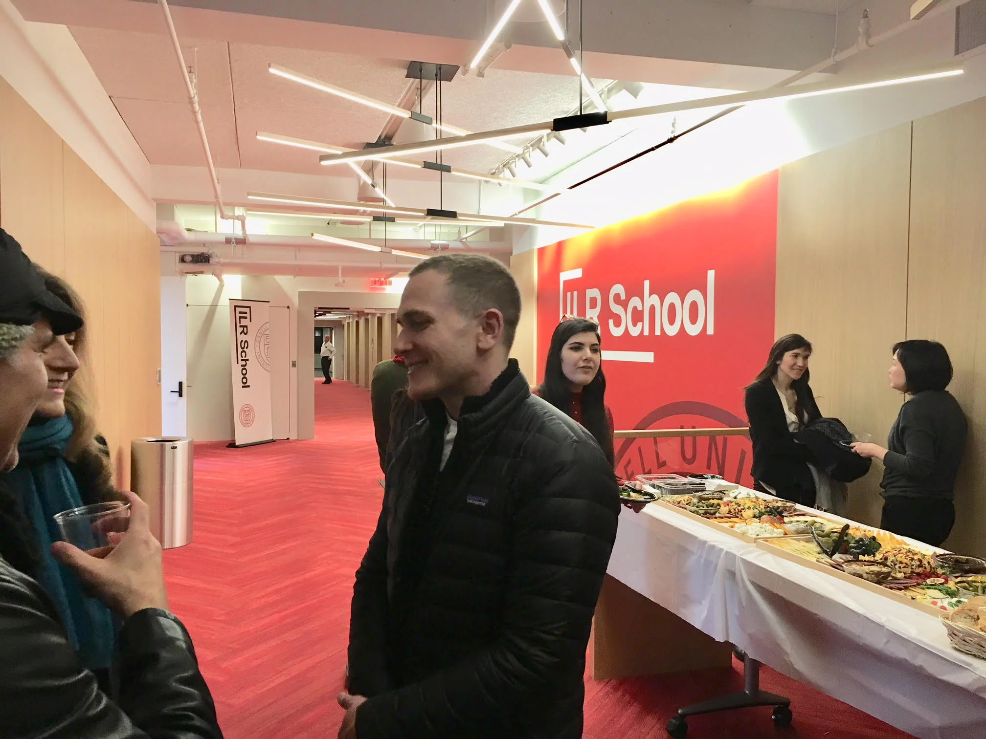 Reception after the Joan Kee and Sergio Muñoz Sarmiento conversation celebrating the launch of Models of Integrity: Art and Law in Post-Sixties America by Joan Kee. Pictured here are alumni and attendees (February 2019).
