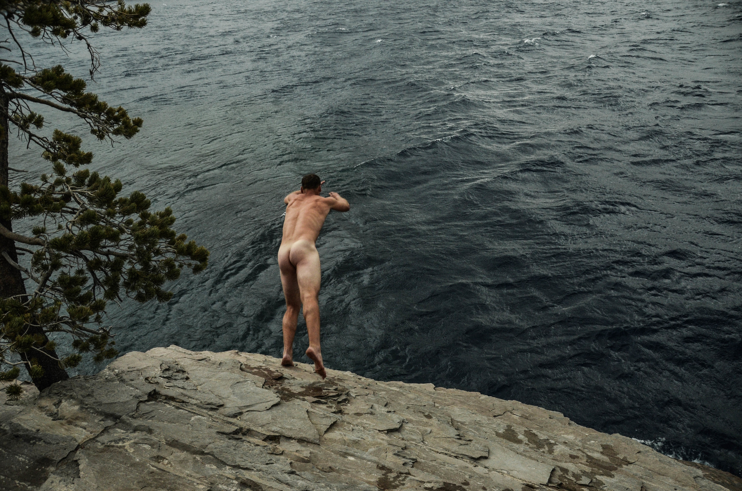 Ty goes head first into the deepest lake in the country. No shirt, no shoes...Crater Lake DGAF's. All 1,946 feet.