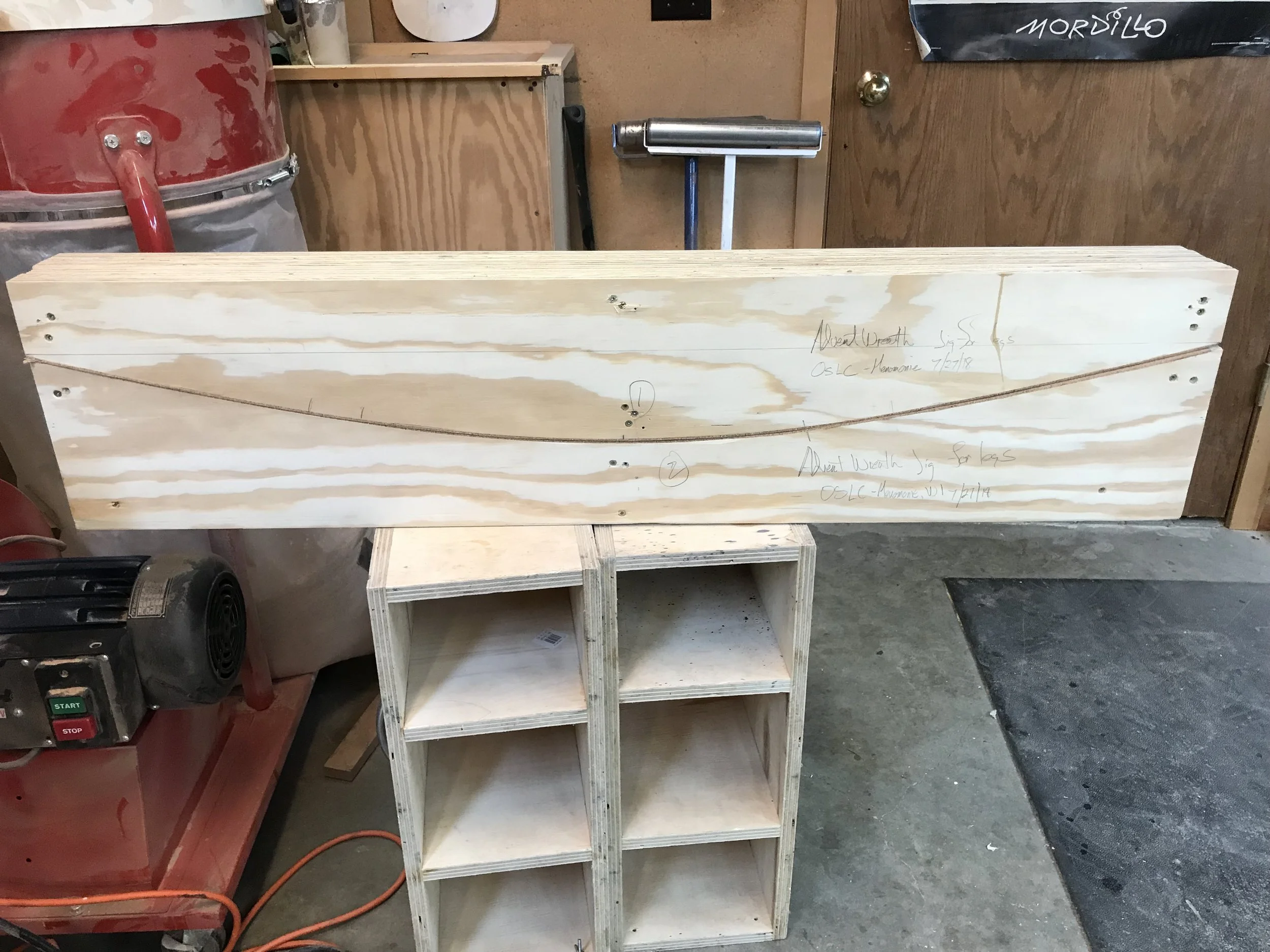 This is the plywood block form, used for shaping the resawn 1/8” pieces into legs.