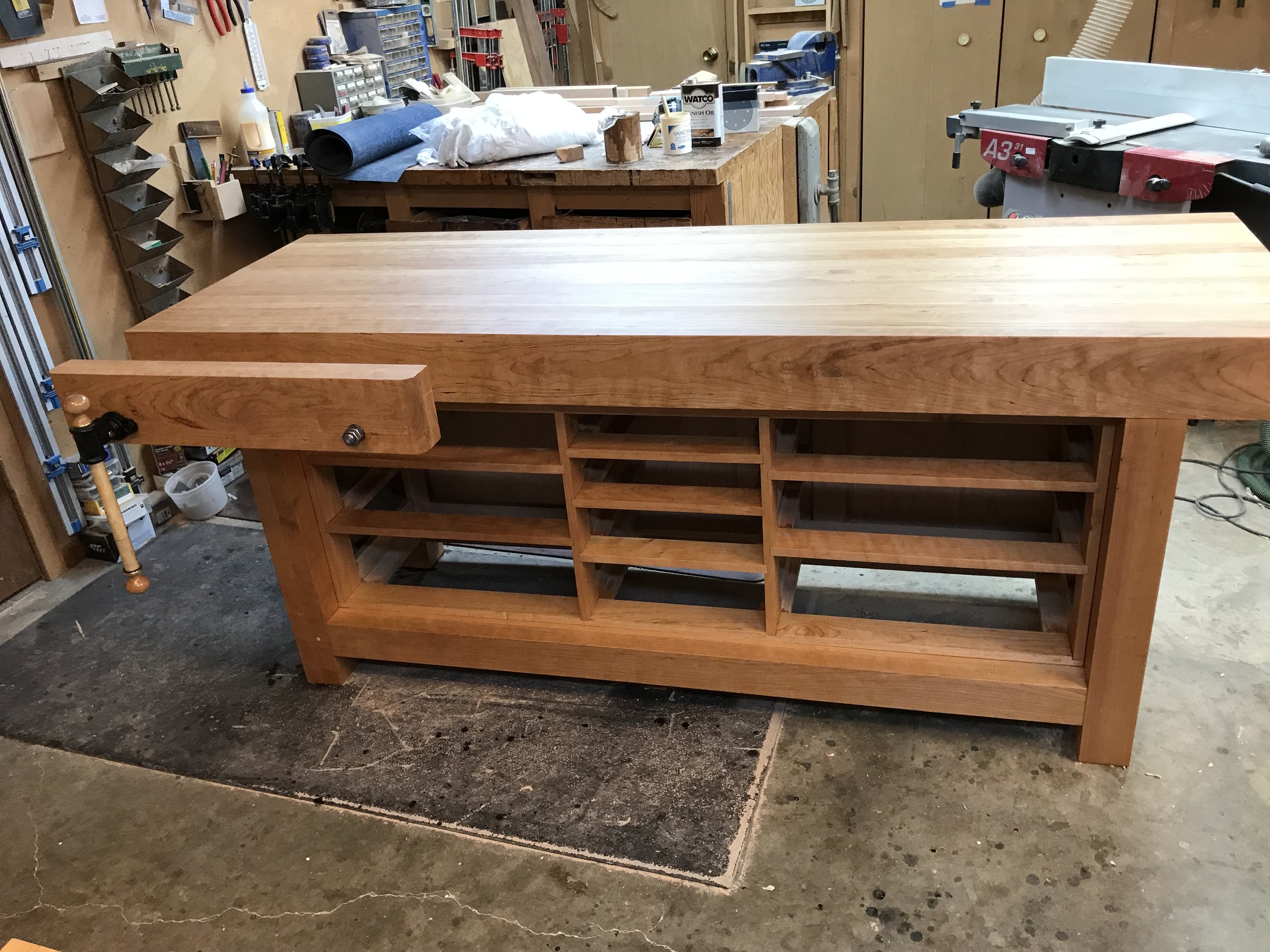Photo of bench without drawers and with vise extended.