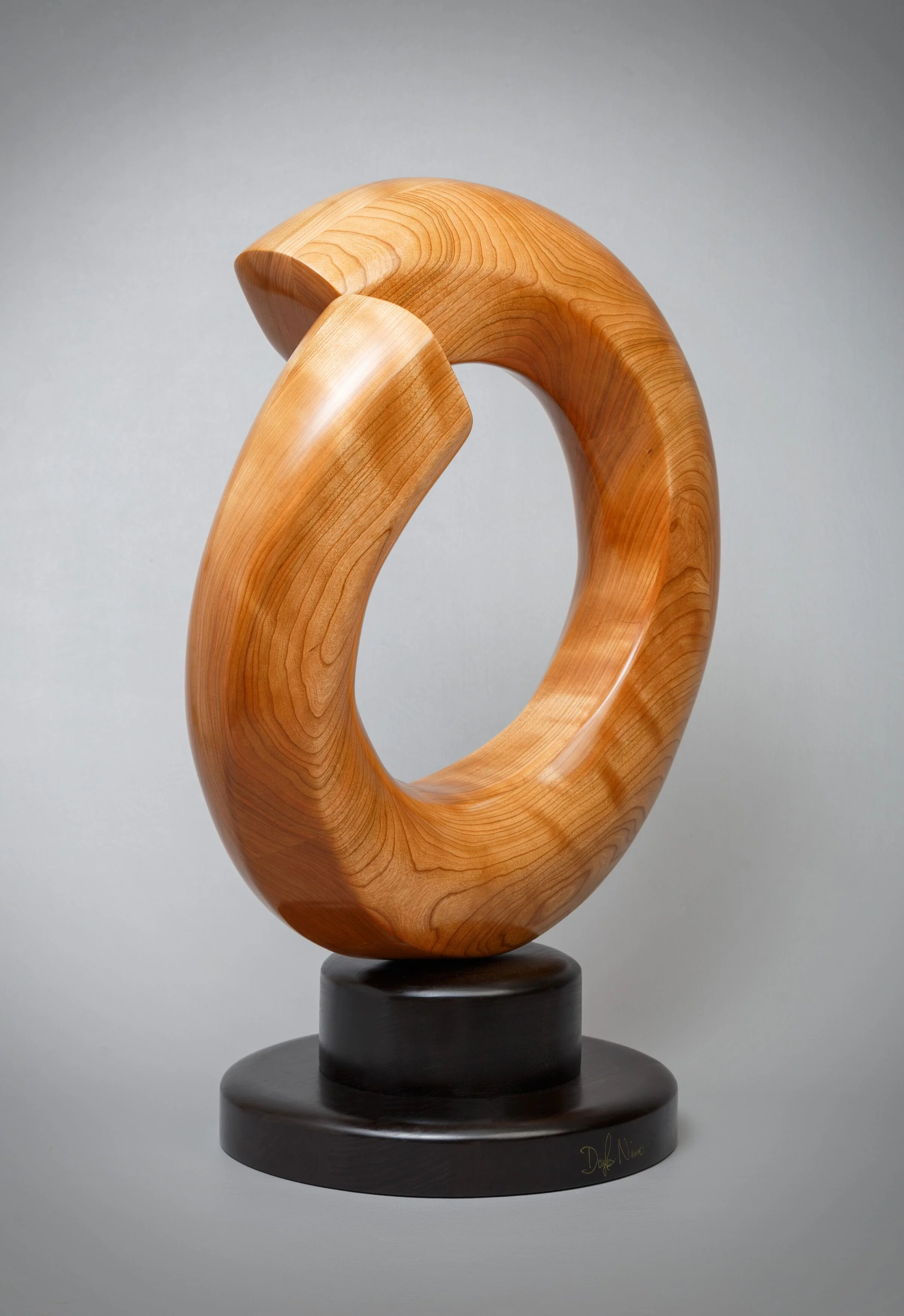 Mobius><Terminus - 20” diameter x 8” deep. Cherry; finished in tung oil.