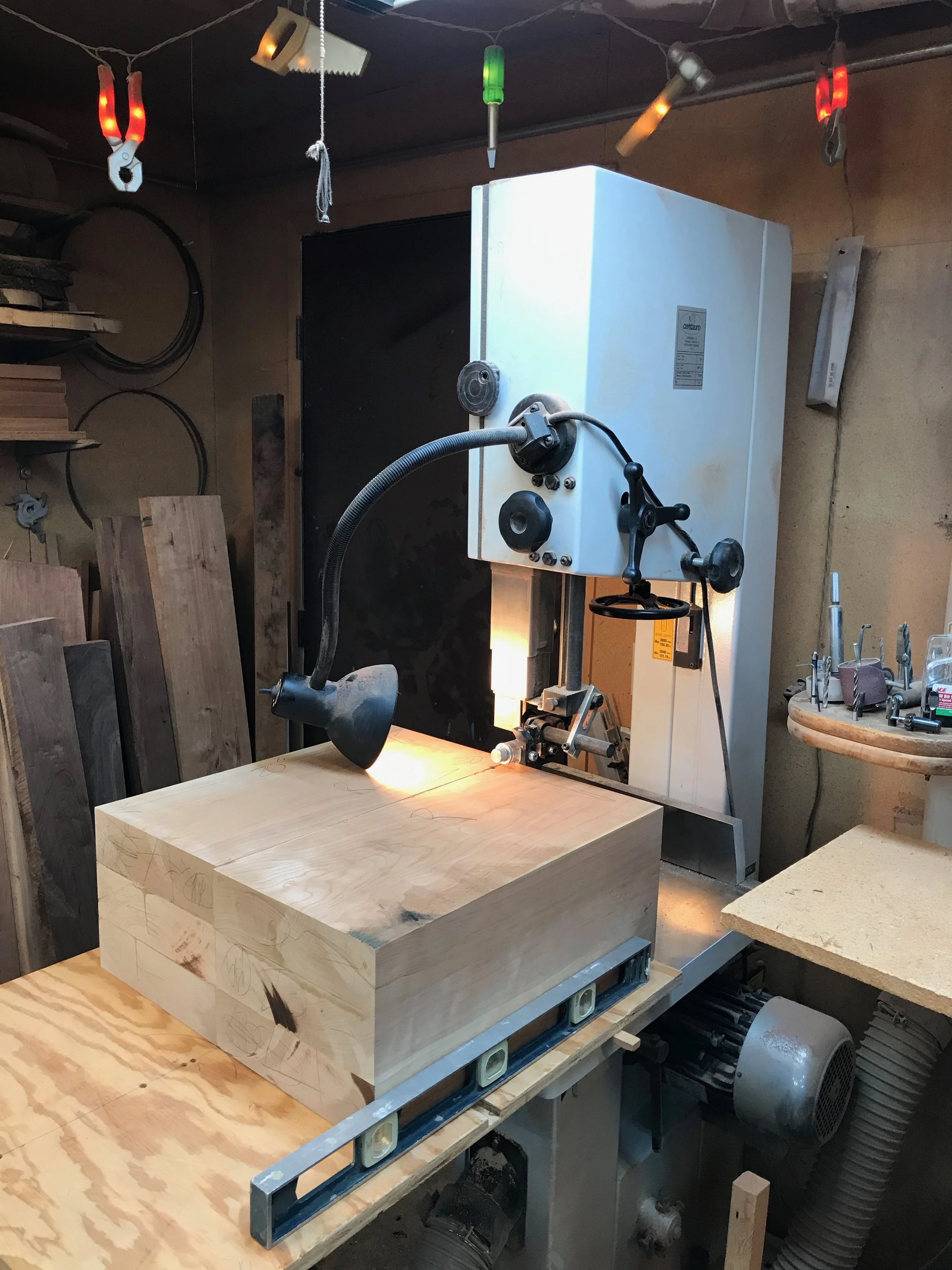 At the bandsaw, being readied for the circle cut.