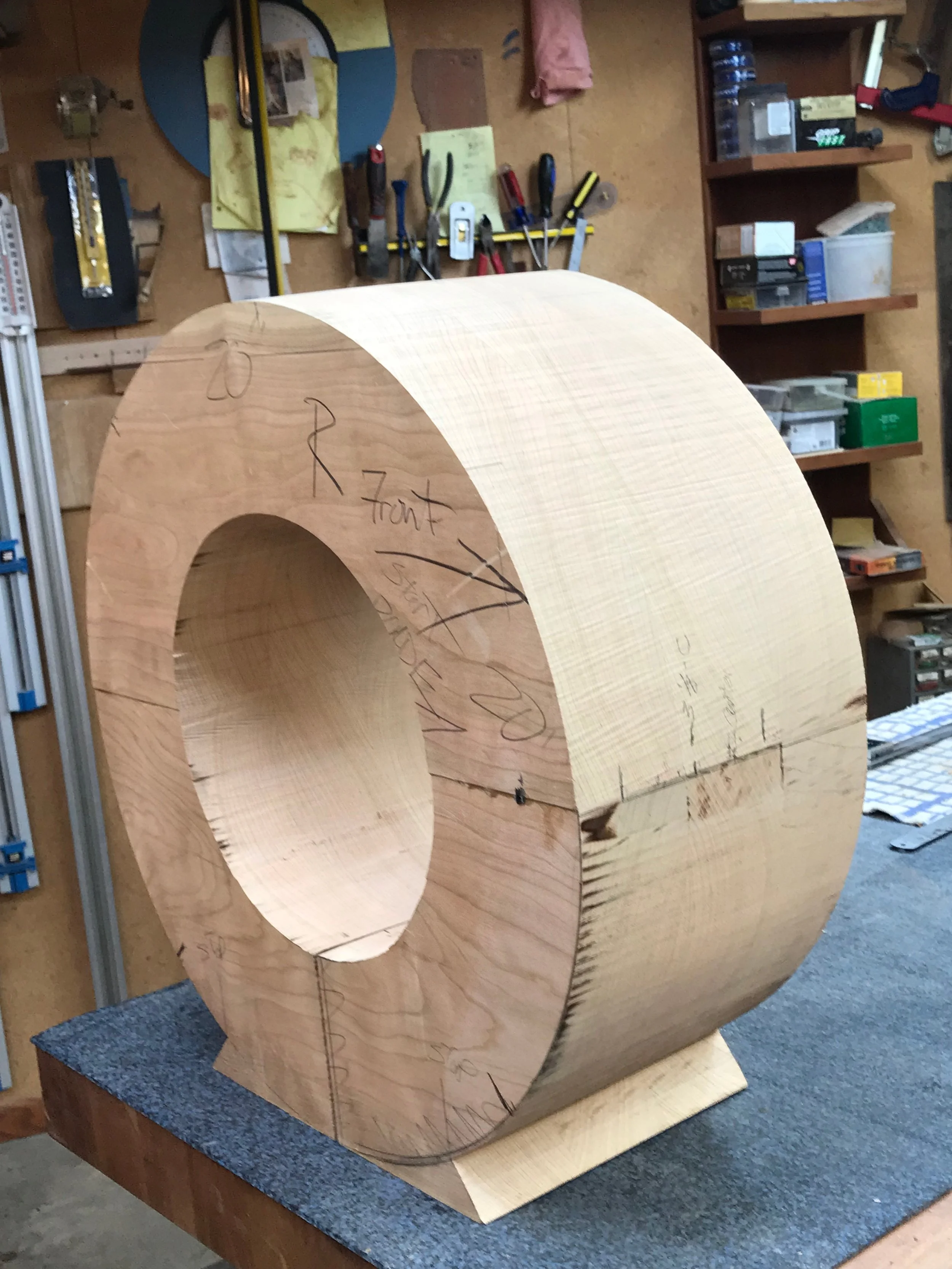 After opening a kerf line at the base to the center, I circle cut the center and removed it.