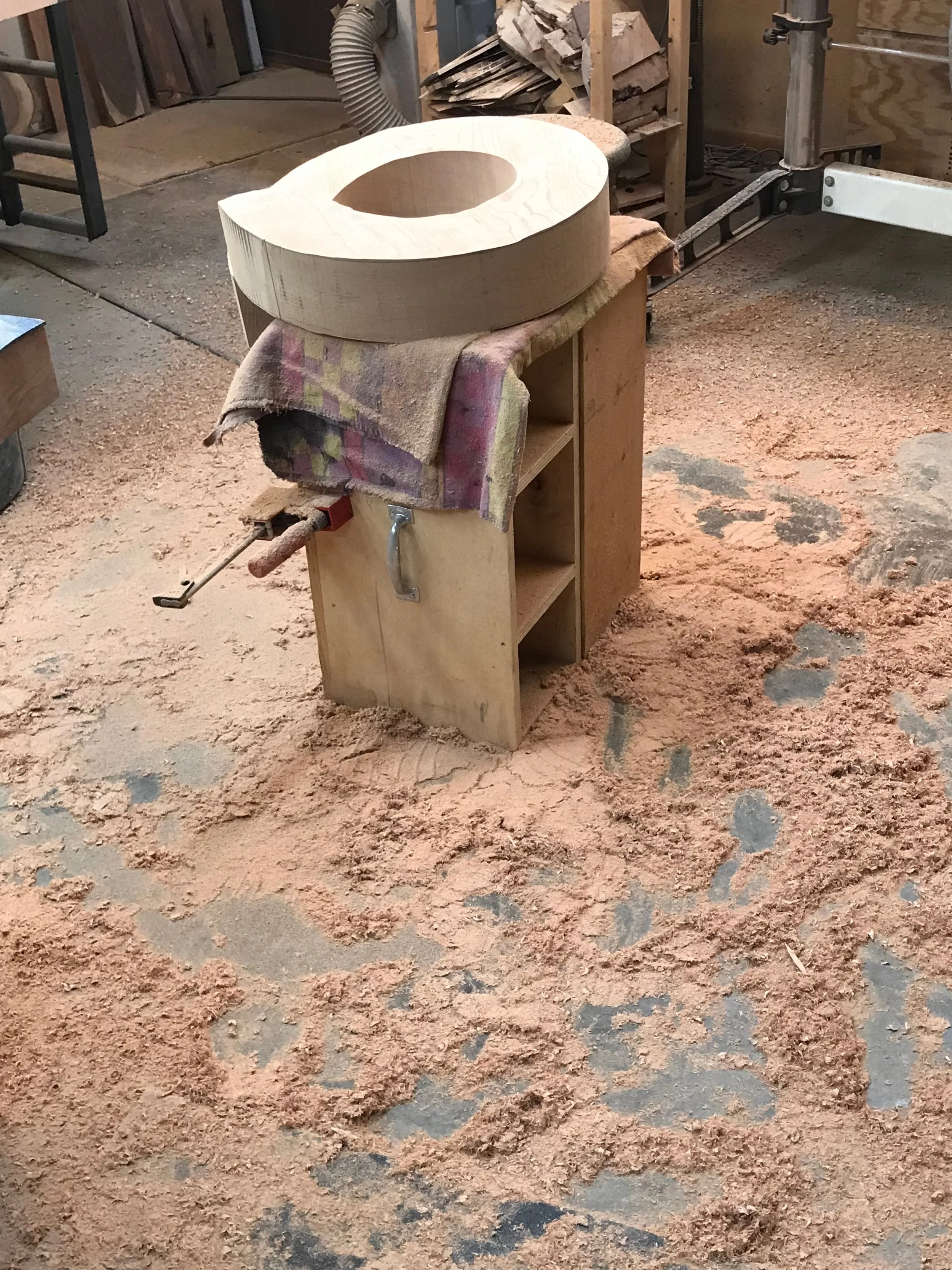 This image shows the piece being '“roughed out.” As one can see, the amount of sawdust is dramatic!