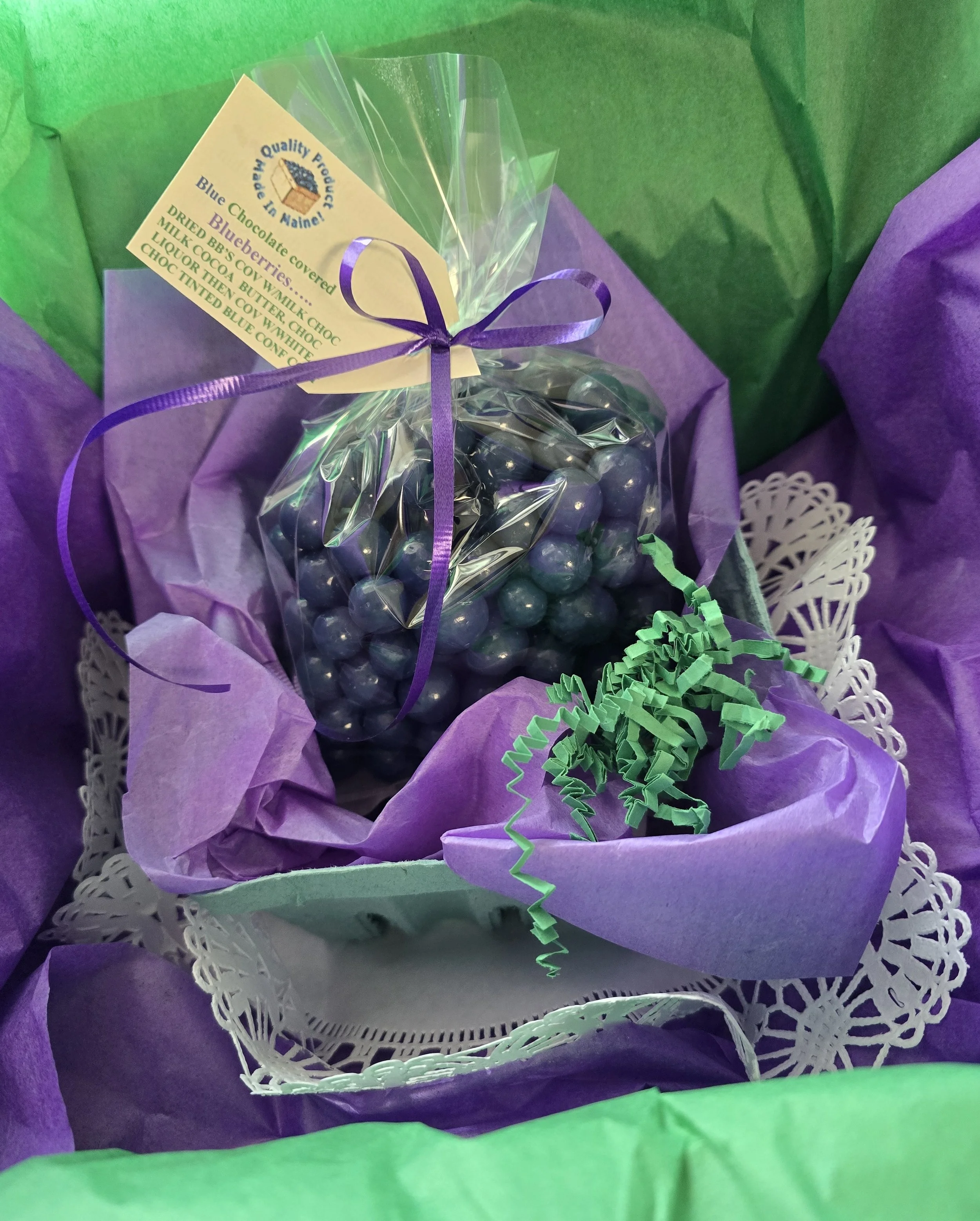 Maine Blueberry Blue chocolate covered Blueberries in green fiber basket 2026 in shipping box.jpeg