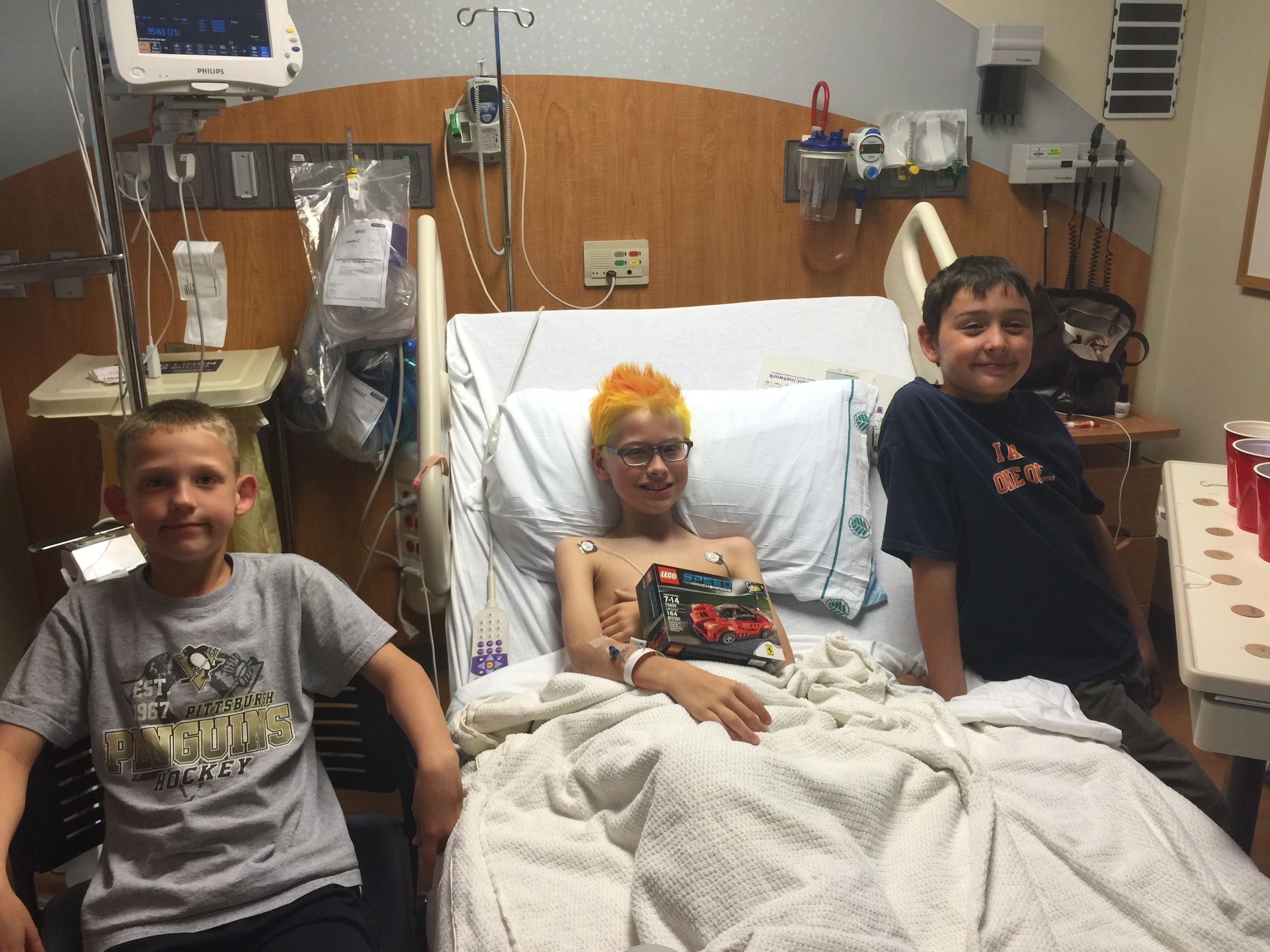 2015 E with boys in hospital.jpeg