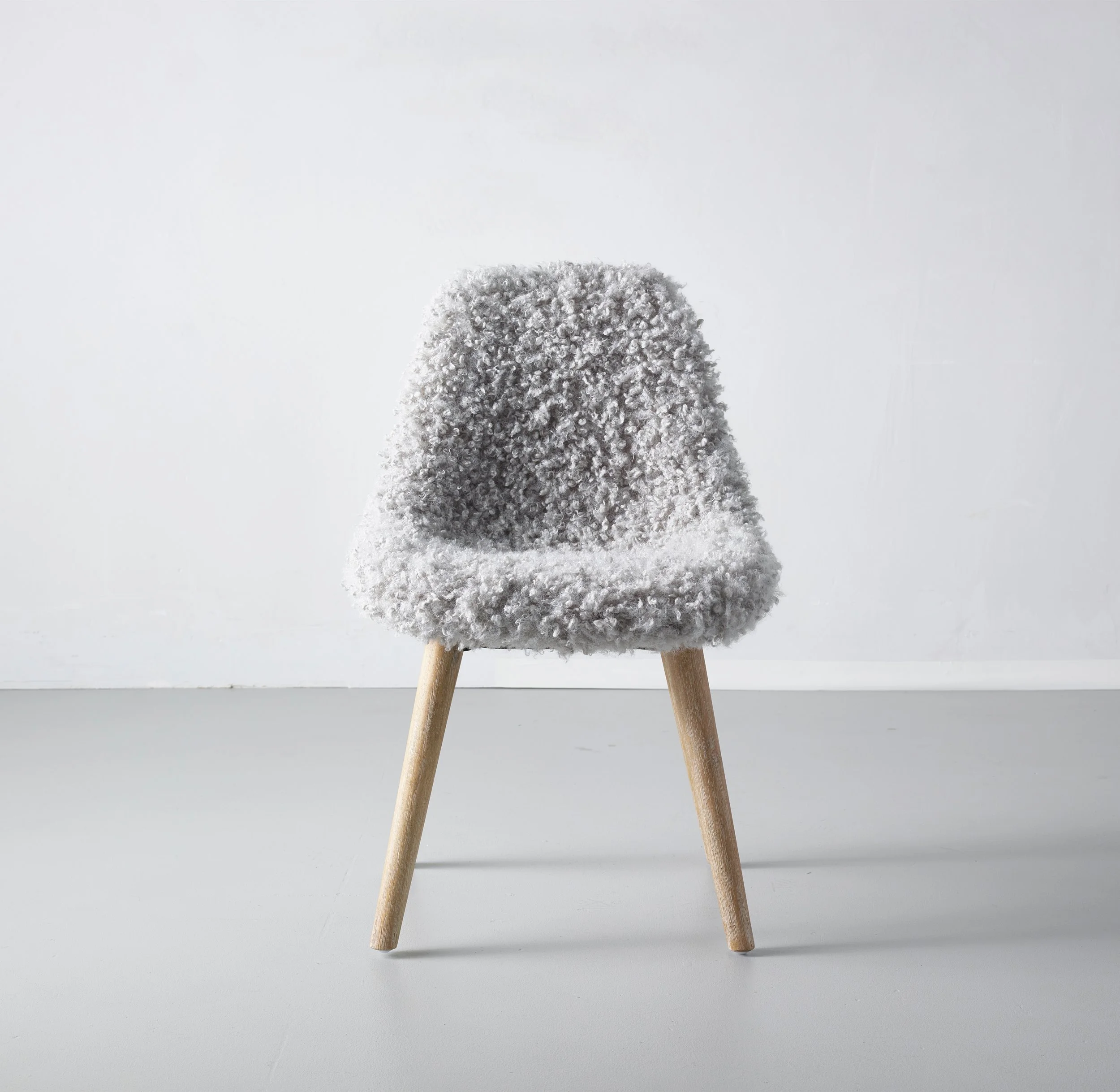 LARKINPLAYCHAIRFAUXMONGOLIANLAMBGREYGREY_rhbc_prod964010_E517397944_F copy.jpg