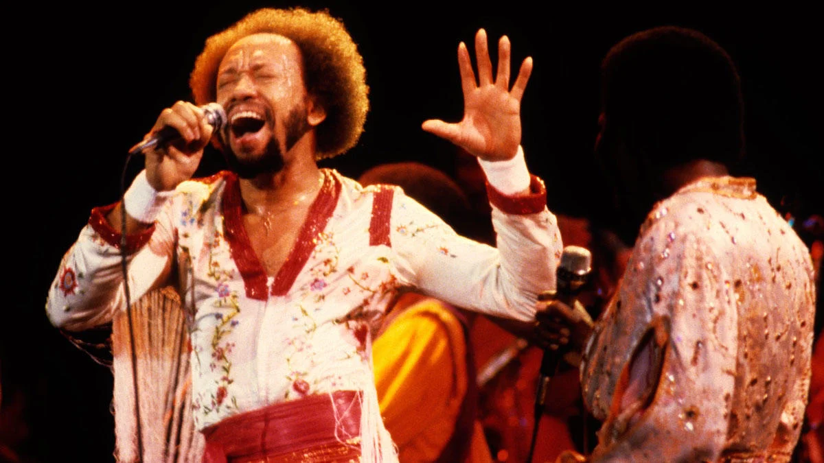 MAURICE WHITE (1941-2016) - The producer / songwriter / musician / front man / creator of Earth, Wind & Fire , the multi-award-winning band that became the voice of a generation in the 70s-80s, the sound of sophisticated jazz-fused funk and purveyors of an Afrofuturistic aesthetic that lit a flame that burns even brighter today, 30 years later.