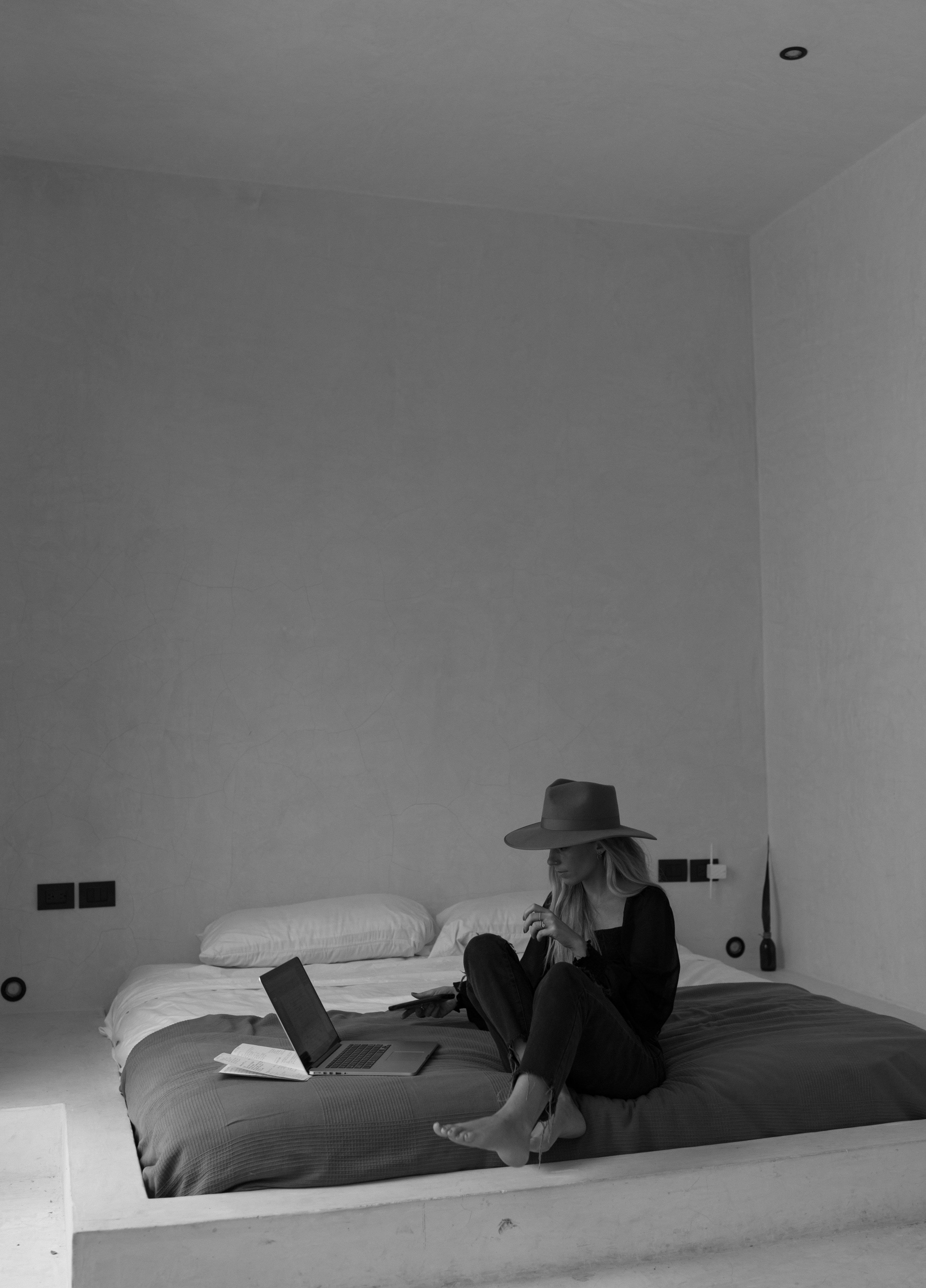 Melissa Marshall working from a laptop during an online photography mentor session focused on creative direction, editing, business strategy, and portfolio guidance.