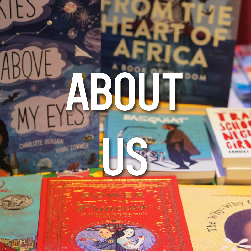 Image description: A close up of various children's books with bright colours. Text on the image reads: 'About Us' 