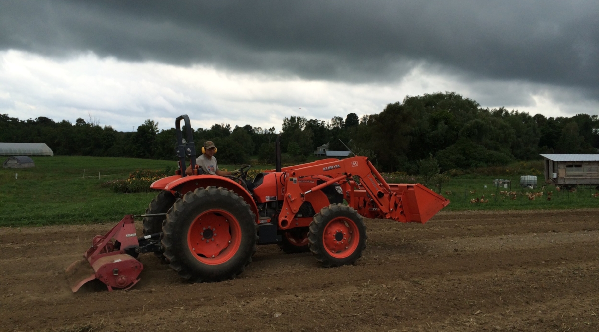Operating the roto-tiller (on last year's super dry soil!)