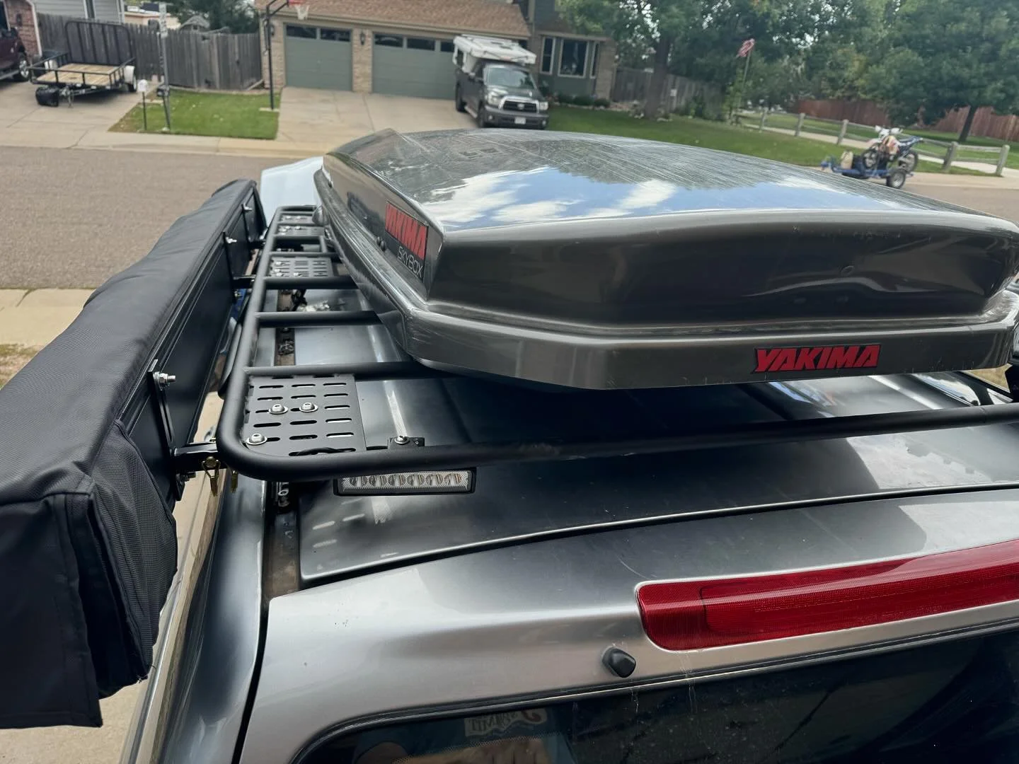 Call it yesterday&rsquo;s install&hellip;. #essentialexpo rack on the #lx470 #100serieslandcuiser .  Fun one with the added #ironman4x4 awning, #maxtrax and Yakima box- all color matched.  Great looking setup Tom, thanks again for all the support and