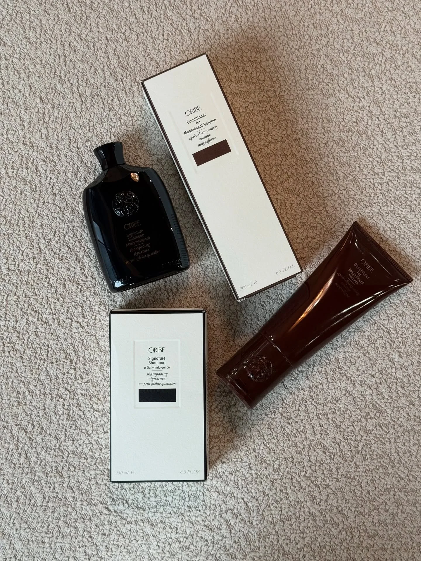 ✨ The secret to salon hair at home: Oribe Signature Shampoo + Magnificent Volume Conditioner. Clean, soft, bouncy&mdash;every single wash