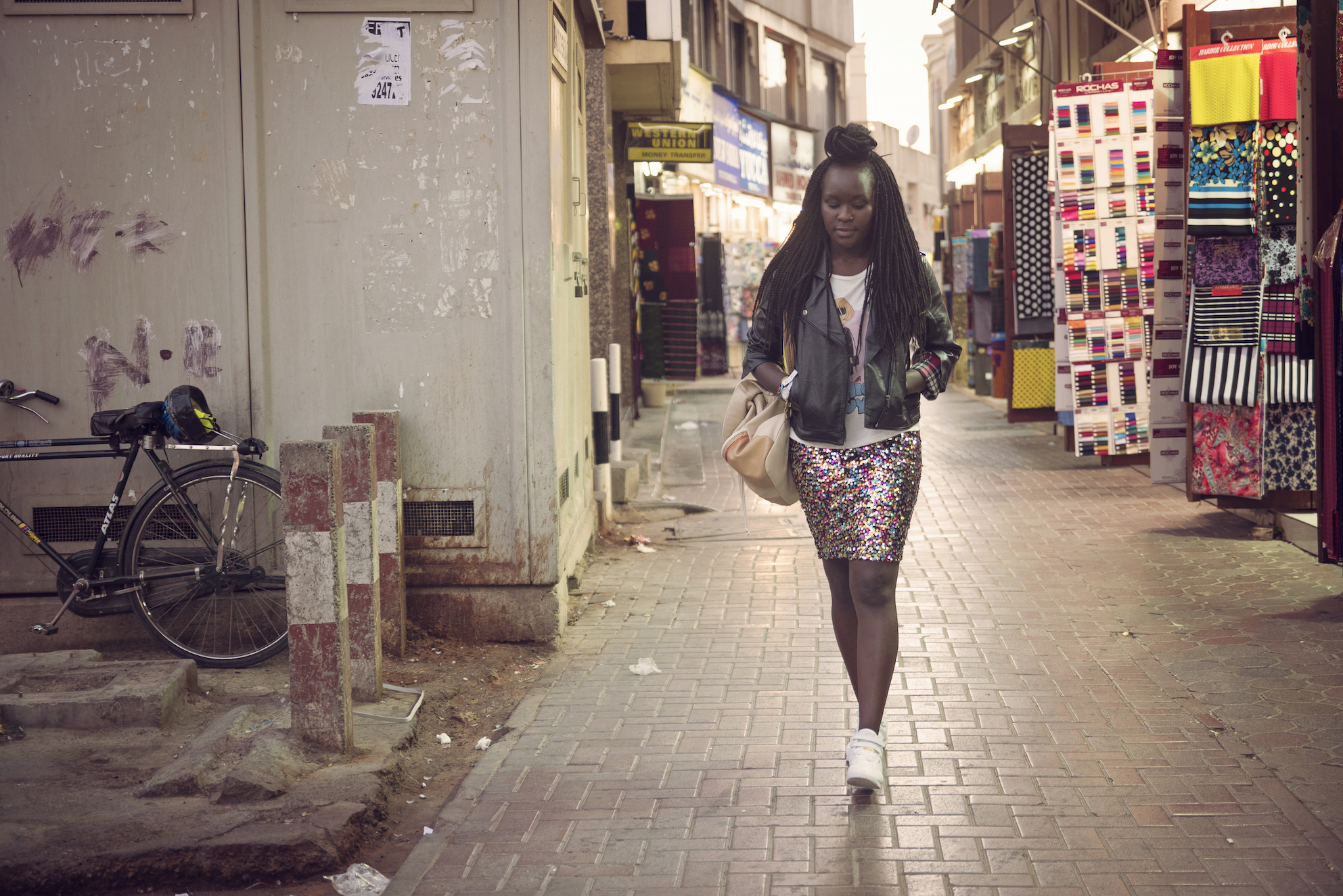 Joanne bio : Joanne, known lovingly as ‘Jo’, is a London girl of Ugandan origin who moved to Dubai 3 and a half years ago. Her background is in fashion design, she specializes in children’s wear while also designing across both men’s and women’s wear. She originally came here to pursue a design position, but has since gotten into Social Media Marketing and currently manages the operations for WEST LA Boutique. What is Dubai to you? How would you define the ‘local’ culture?: It's very much a fast fun lifestyle culture for me! There's always something happening which has only really been the case in the past 1.5yrs or so i've felt, so it's great that week after week you still get excited for the weekend and where it’s going to take you. What do you hate and love about Dubai?: I love the diversity of people here, and although I am a London girl, I'd say I've met a larger mix of nationalities in my 3.5 years here than I have in my 29 years there. I hate that the process of MOST things takes twice as long as it really needs too to be completed! That goes for EVERYTHING!!
