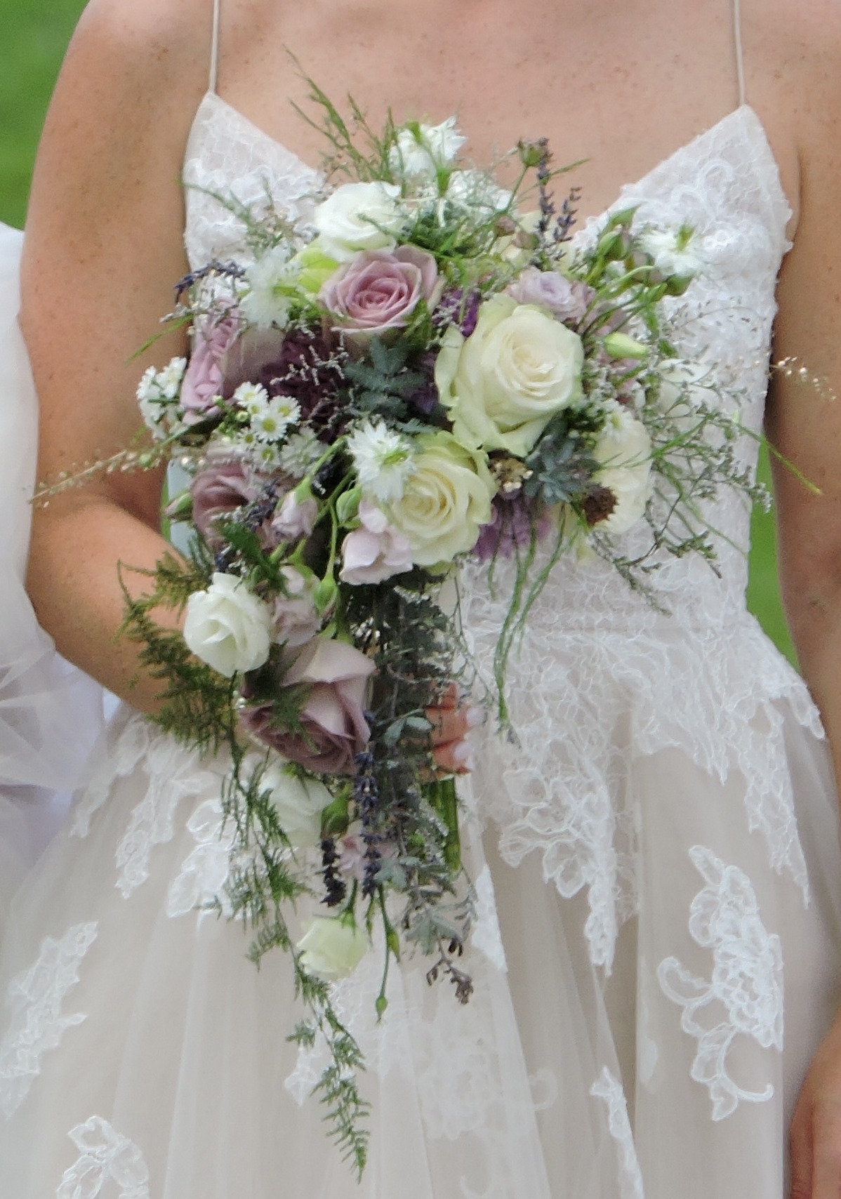  Romantic, cascade bouquet with fine textures evoking feelings of lace 
