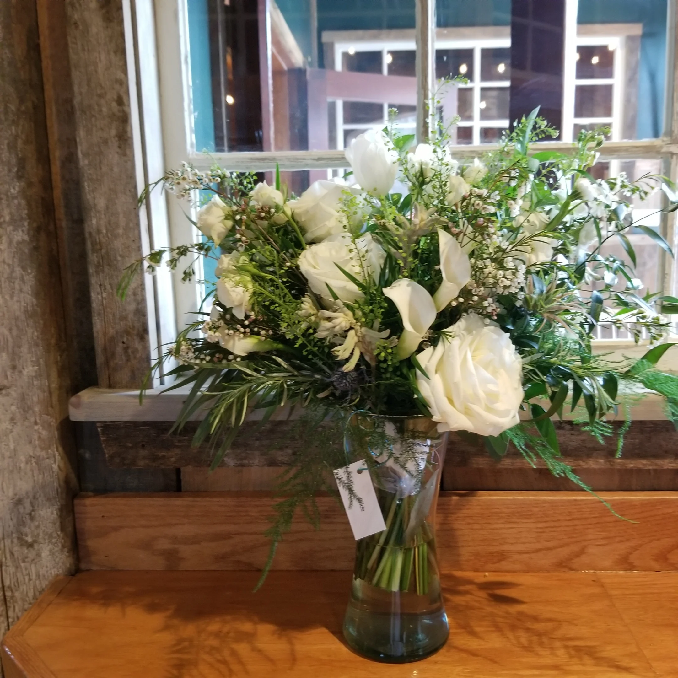 Lush greenery with white flowers