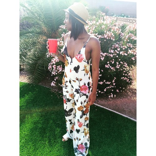 Words from the model Chanique O’Neal: “The floral jumpsuit is perfect because it's so fresh and springy and the print is bold. I can keep my accessories to a minimum, and the jumpsuit is long so my legs won't be cold. I paired it with nude sandals and a Straw hat perfect for the season, especially when I don't have sunglasses.”
