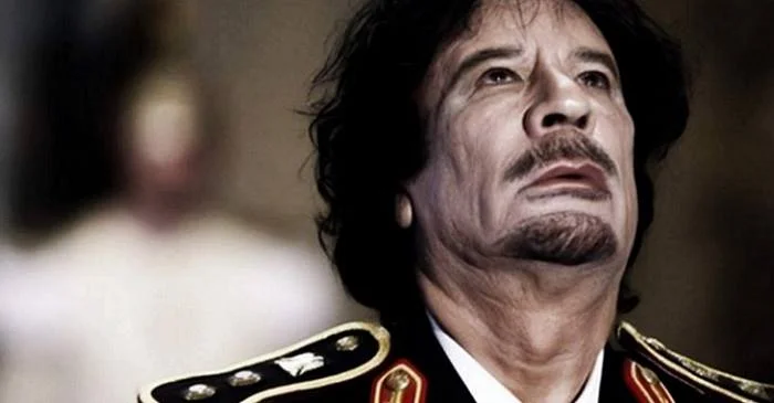 Muammar Qaddafi. Photo taken from Carey Wedler’s article, “The Last Country We ‘Liberated’ From An ‘Evil’ Dictator is Now Openly trading Slaves”